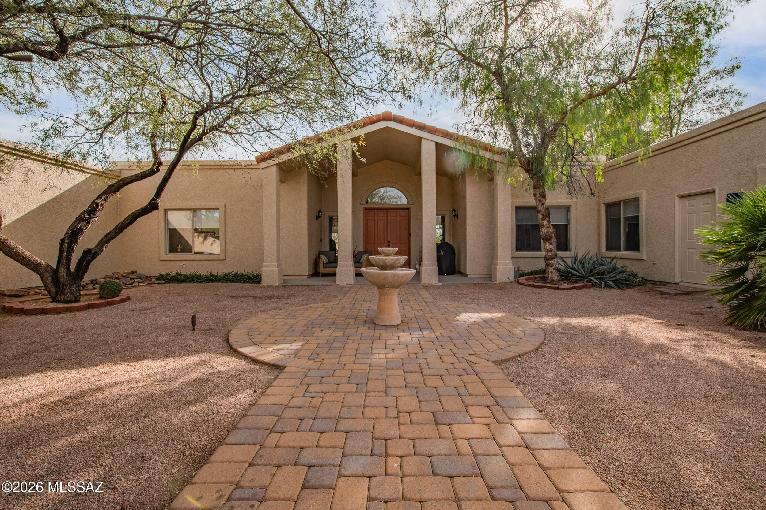 Nestled on over 1/2 an acre on the 1st fairway of the beautiful 49ers Country Club, this 4-BR, 3.5-bath home with additional guest quarters, offers stunning mountain and golf course views throughout. Surrounded by lush mesquite trees, you are welcomed through a large, private court yard. The home features vaulted ceilings and expansive picture windows offering incredible light. The large open kitchen boasts granite countertops, abundant cabinetry, glass tile backsplash, double ovens, and gas cooktop. The renovated primary suite showcases a stone vanity and large walk in shower. Enjoy outdoor living with a covered patio, hot tub, kiva fireplace, and putting green. All of 49ers Country Club's incredible amenities including golf, pool, fitness, and dining are a short walk out the back gate!