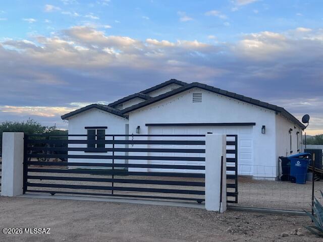 Modern Ranch Home on Acreage.
Move-in ready, site-built 4-bed/2bath 1,826 SF home, on over an acre of propertyMain Features:
Site-built 2022 Builder Home 
4-bed/2-bath, 1826 SF
Greatroom & Dining
1.3 Acre usable fenced property
Custom metal gate with remote
2-car finished garage with opener
Horse facilities, RV's, Hobbies OK.
Model-style all ceramic tile, pallet of modern gray, white, black.
Open kitchen with custom cabinets, stainless appliances.