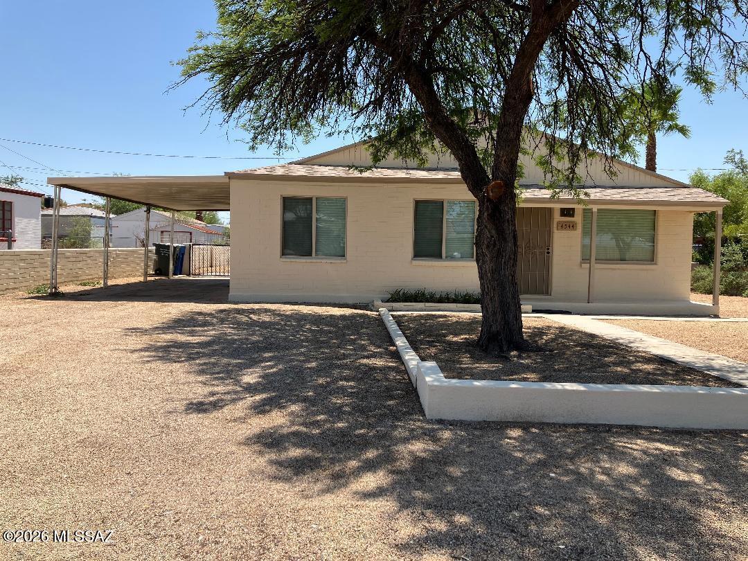 Move-in ready. Mexican tile throughout. Completed in 2026 - new roof, double pane windows, interior and exterior paint. Must see to appreciate all the midcentury character. Refrigerator included as-is.