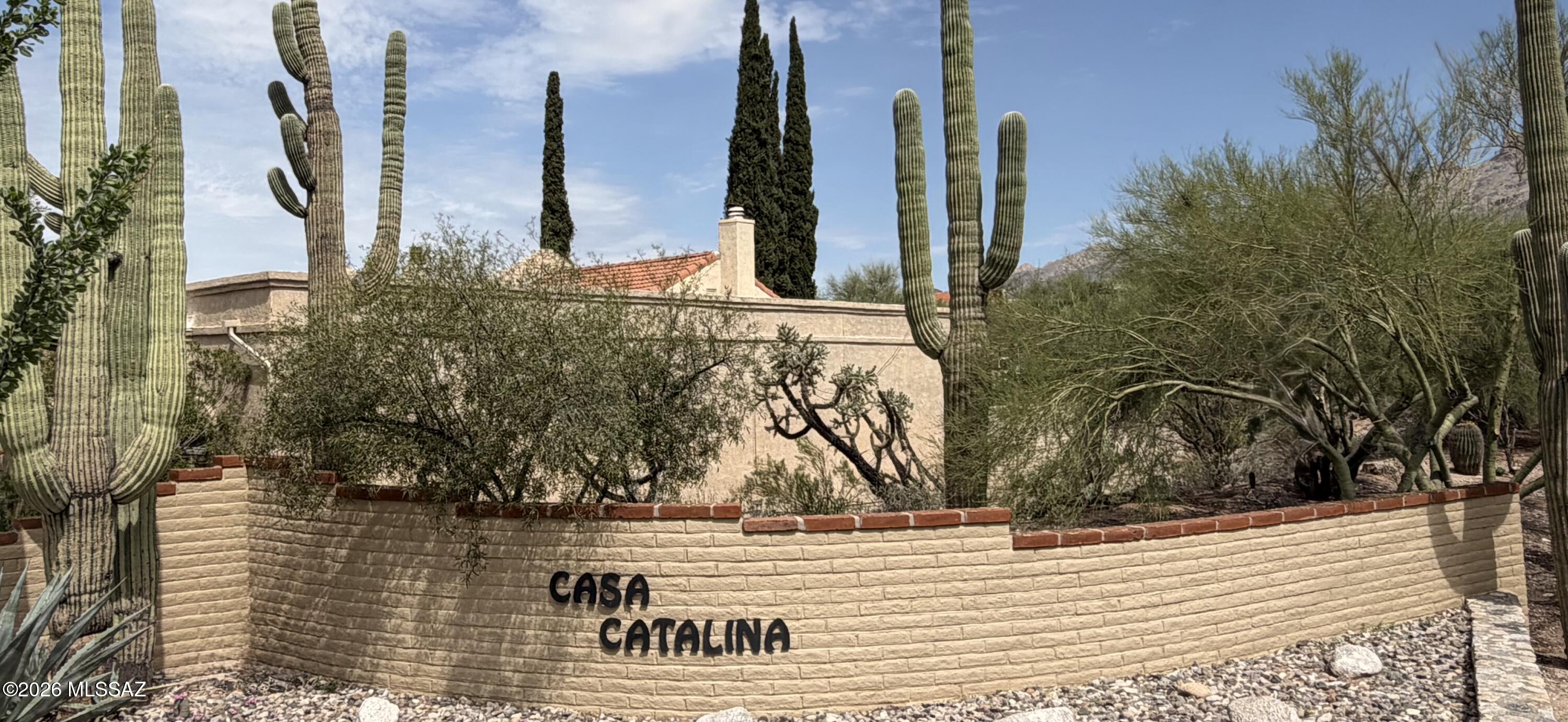 This charming foothills townhome offers a rare opportunity in one of Tucson's beautiful Catalina Foothills communities. This lovely home is one of only 23 townhomes in its intimate subdivision, offering a warm and inviting setting with an open floor plan, large master suite with vaulted ceilings, a gas or wood burning fireplace, a second bedroom suite, an atrium patio, and a north facing patio that captures outstanding views of the Catalina Mountains. Residents enjoy access to a community pool,spa and spacious clubhouse, just a few of the many highlights that make this property and neighborhood so special.