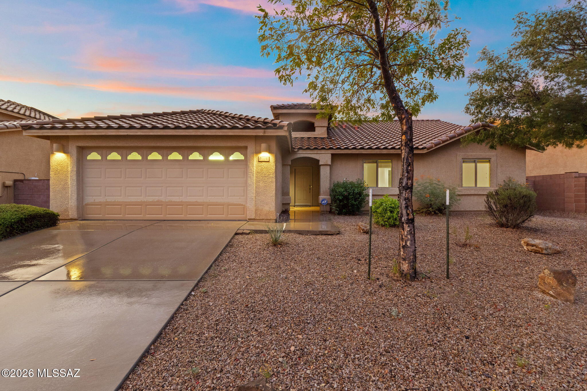 Beautifully maintained by its original owner, this move-in ready 4-bedroom, 2-bath home offers 2,174 sq. ft. of comfortable living space. The freshly repainted interior creates a bright and inviting atmosphere, while the functional floor plan is perfect for everyday living and entertaining. Step outside to an incredible backyard featuring a built-in outdoor grill and cozy fireplace--ideal for hosting family and friends or enjoying Arizona evenings. Situated on a fantastic lot in a desirable community with a neighborhood park, this home also offers the convenience of low-maintenance living. Don't miss the opportunity to own this exceptional home that perfectly blends comfort, functionality, and inviting indoor-outdoor living.
