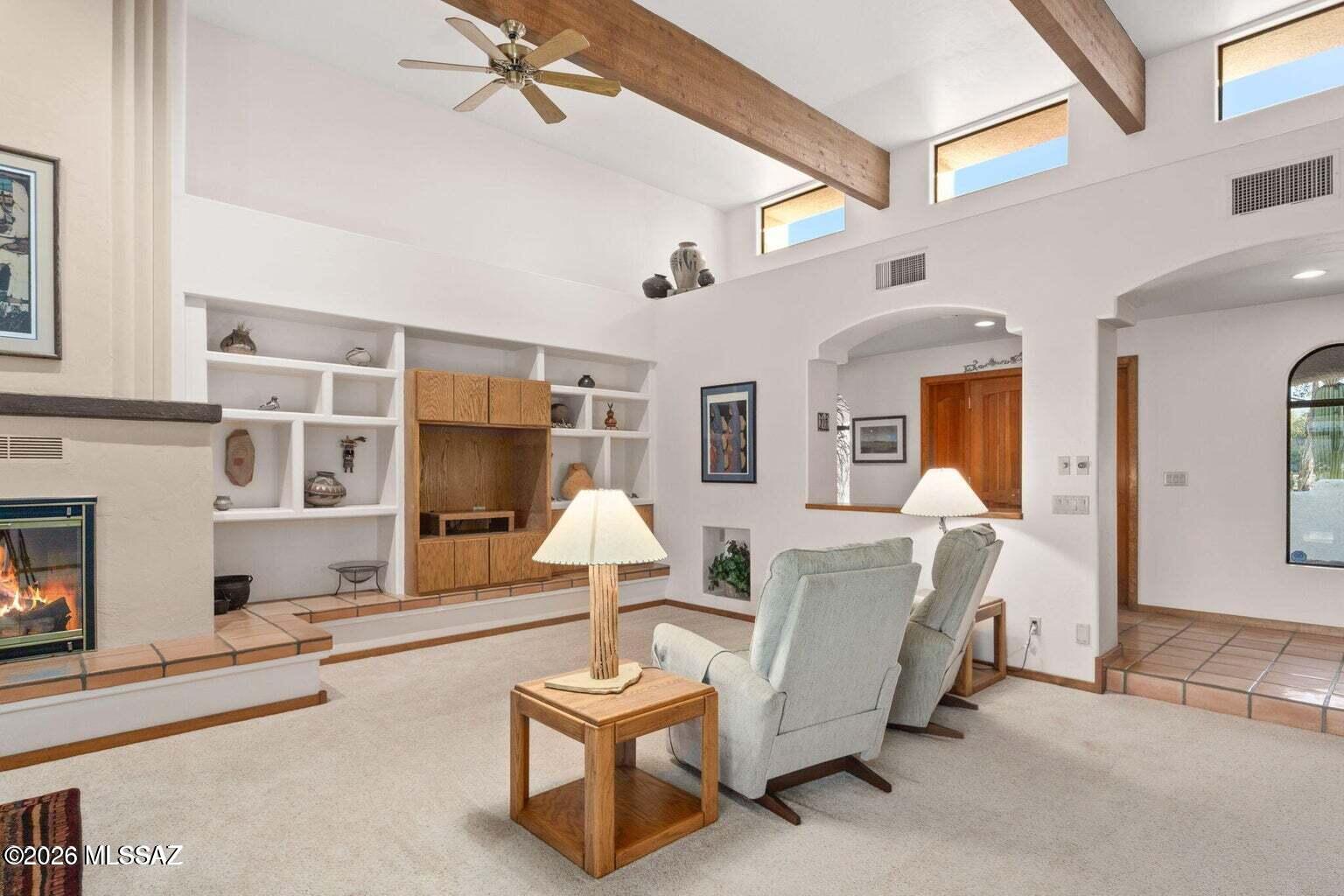 A ''Notch'' above--just around the corner from 67,000 protected acres of Saguaro Nat'l Park and its 128 miles of scenic hiking trails--this 3,775 sq ft custom-built Southwestern home sits on 4.41 acres w/ NO HOA in rural, quiet 'Notch' neighborhood. Great room w/ fpl & wet bar, 14' high beamed ceilings, clerestory windows, walls of over-sized sliders bring the outside in.  Custom homebuilder's personal home offers a level of quality craftsmanship newer construction can't replicate w/ original oak finishes paired w/ modern updates. Large primary suite for spacious living.  Newer kitchen appliances, granite counters, modern electric cooktop.  Beautifully crafted built-in oak cabinetry throughout.  Heated/cooled AZ room w/spa. Hike w/ hoofs, shoes, paws, baby carriage ðŸ˜Š  Continued....