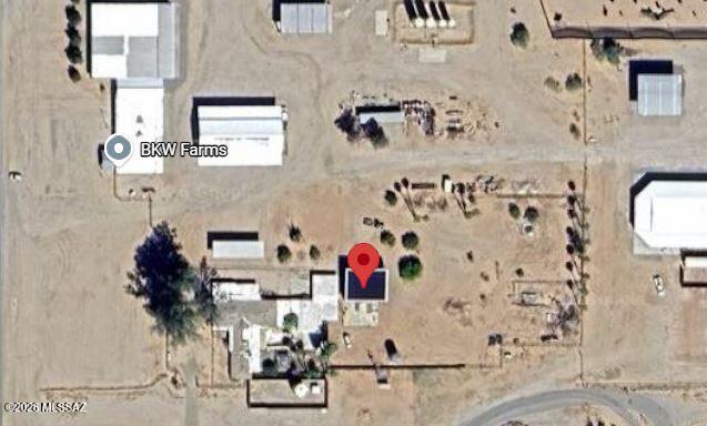 This is a unique property. It is state lease with several buildings on it. The main building, formerly a large office, is currently occupied. It has an upstairs and a basement with a big open space and a semi-truck scale. This property is unique; call us for details, as a written description won't explain it.