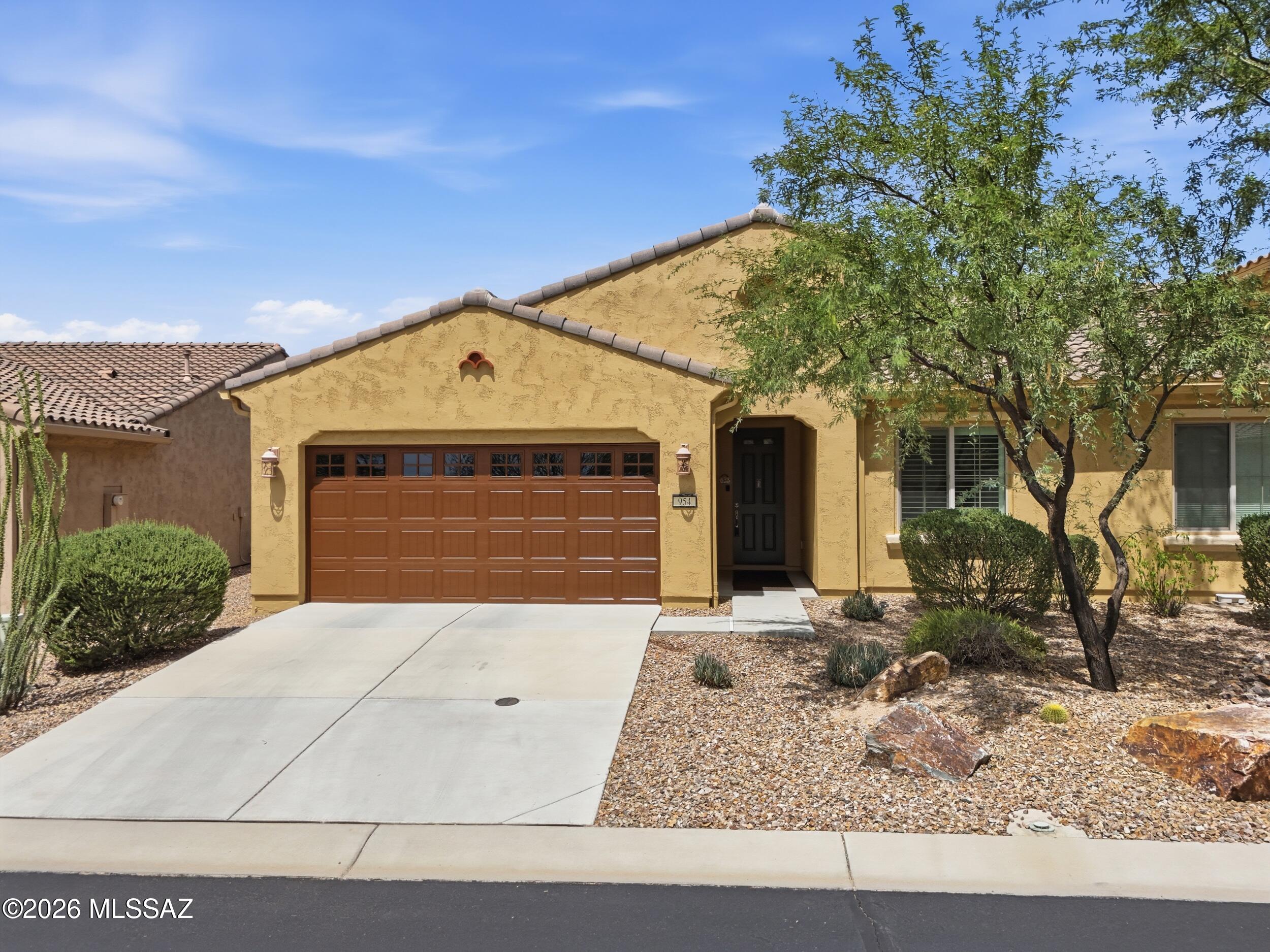 Fully furnished 2BR/2BA villa in gated Quail Creek, one of Southern Arizona's premier 55+ communities. Built in 2016, this 1,529 sf home features soaring cathedral ceilings, designer upgrades throughout, and high-end furnishings included, right down to the smart thermostats. Enjoy low-maintenance living on a .08 acre lot, truly turnkey and move-in ready. Residents have access to the brand new Canyon Club with resort-style pool, fitness center, and bistro, plus the Madera Clubhouse and Anza Athletic Club offering tennis, pickleball, and bocce ball. Golf lovers will appreciate three 9-hole championship courses set against the Santa Rita Mountains. The community also features a Creative Arts Center, dog park, and gated entry with roving security patrol. Tucson is just 25 minutes away.