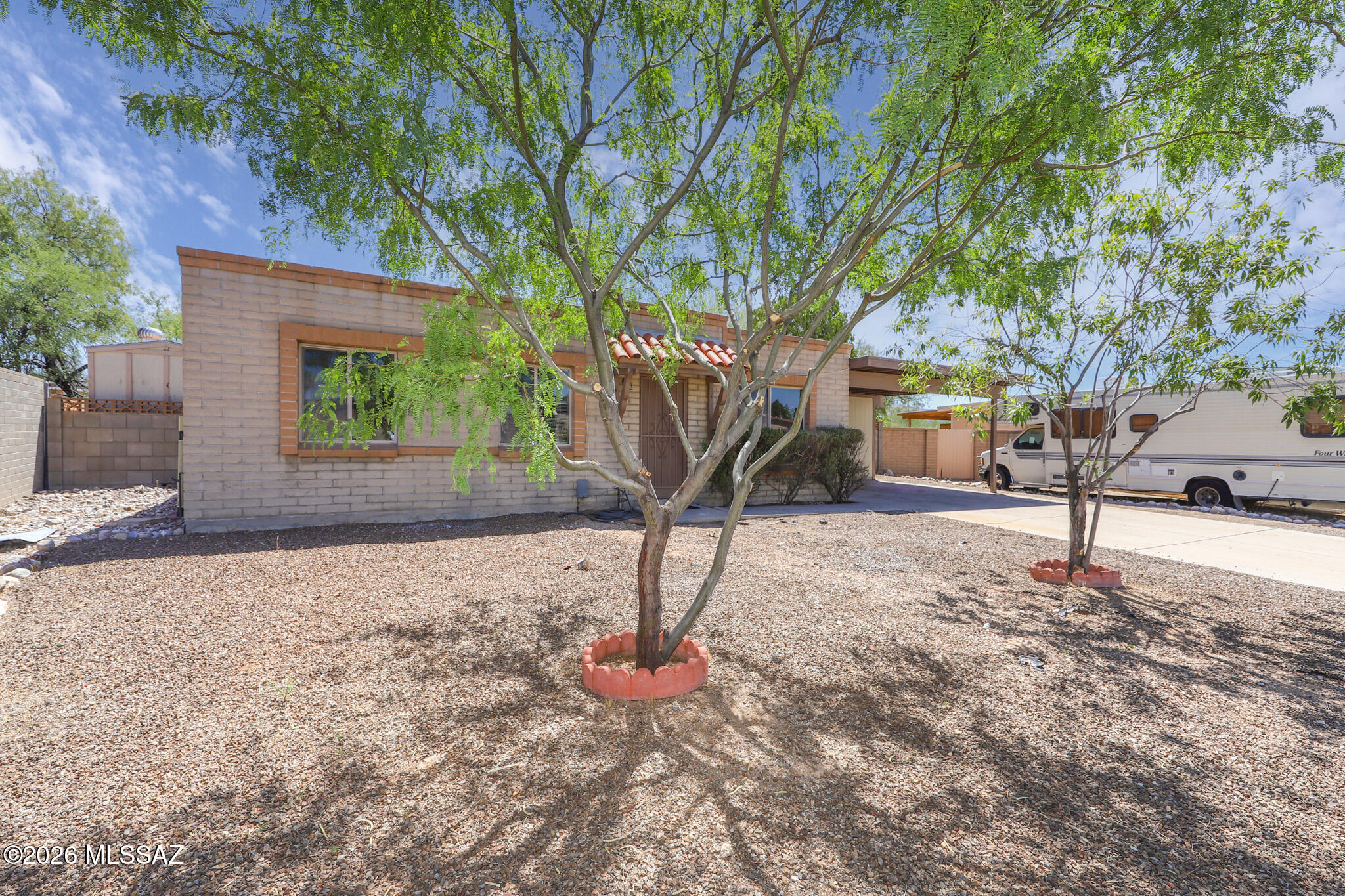 Welcome home to this East Tucson gem with no HOA! This 3-bedroom, 2-bath home offers a flexible bonus room perfect for a home office, playroom, gym, or additional living space. The updated kitchen features modern finishes and ample storage, while brand-new interior paint gives the home a fresh, move-in-ready feel. Major updates include a newer A/C unit, water heater, and a new gutter system with warranty for added peace of mind. Conveniently located near shopping, dining, parks, and scenic walking trails, this home combines comfort, functionality, and an unbeatable location. WITH ACCEPTABLE OFFER- SELLER OFFERING 1% CREDIT TOWARDS AN INTEREST RATE BUY DOWN. (ACTUAL COSTS DEPENDS ON LOAN AMOUNT AND LENDER QUOTE, AND SUBJECT TO LENDER AND CONTRACT TERMS.