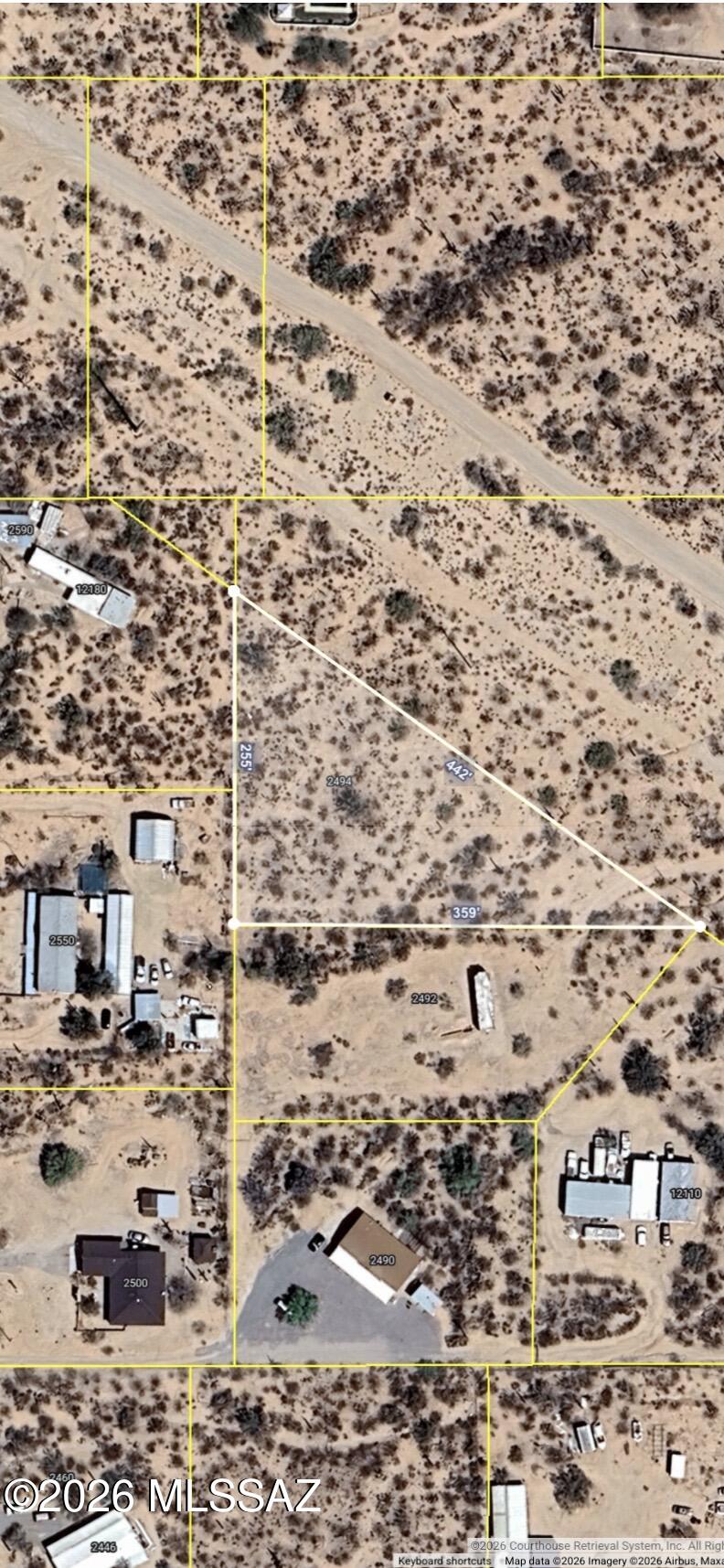 Stunning Build-Ready Lot with Panoramic Views! Discover the perfect canvas for your dream home at 2494 N Camino Avra. This flat parcel offers breathtaking mountain views and some legwork in place. Sandario water is at the street; electric is just 50 ft from the lot line; needs septic & propane.
 A recent survey was completed with all corners staked, and a perc test was completed in 2005. GR-1 Zoning allows you to customize the land to your needs with site builds, manufacturers, and some agricultural options allowed.