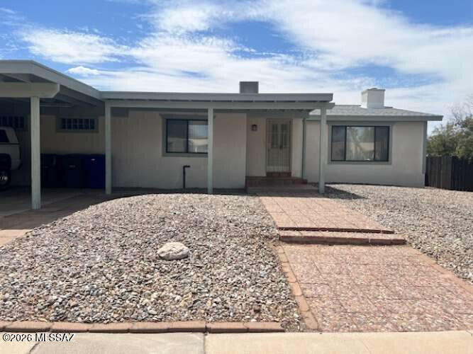 NO HOA! This unique tri-level pool home boasts a spectacular 20 x 20 activity room addition with timeless terra cotta tile and a kitchen straight! Enjoy relaxing in your completely rebuilt pool and deck area - perfect for AZ summers and fully secured by an up-to-code locking safety fence. Built for Gathering- The backyard features an inviting circular pool designed to encourage gatherings with therapeutic bubbles and treats. Outdoor Living - A massive 20 x 15 shaded back porch overlooks an expansive, level yard the size of a tennis court or soccer field - ready for your personal creative touches. Double gates easily fit RV or boat.