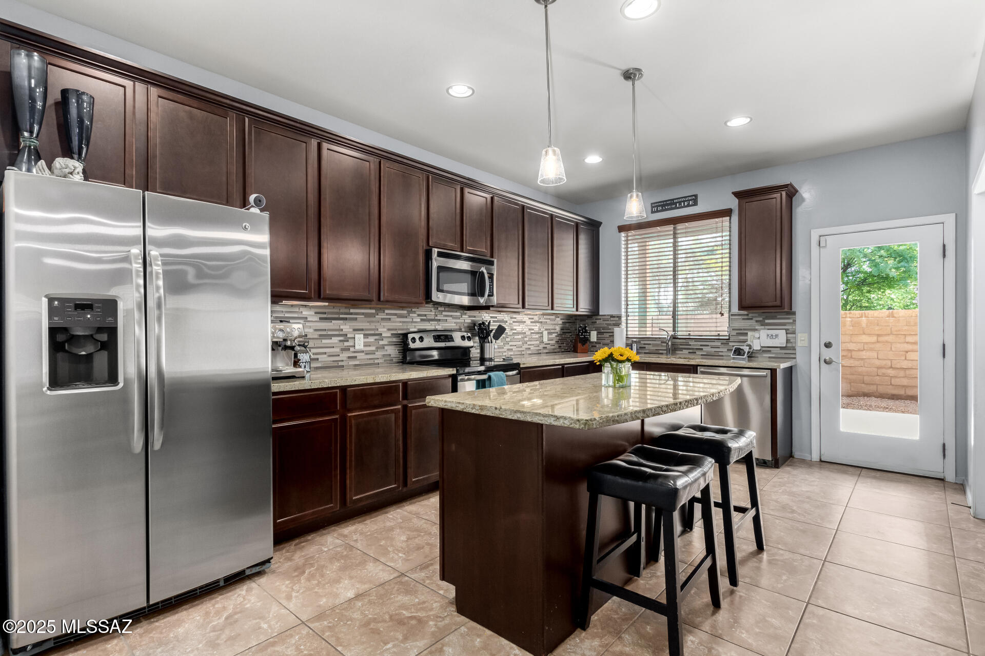 Location, location, location!!! This beautifully cared for, move-in ready, 3 bedroom, 2 1/2 bath is located in a highly sought-after gated community, within 5 minutes from St.Phillip's plaza, 10 minutes from La Encantada, and has direct access to ''The Loop.'' The home features an open concept with a large island to overlook the downstairs living area. All bedrooms located upstairs with generous bedroom sizes. Don't forget the community has a pool, spa and gym!