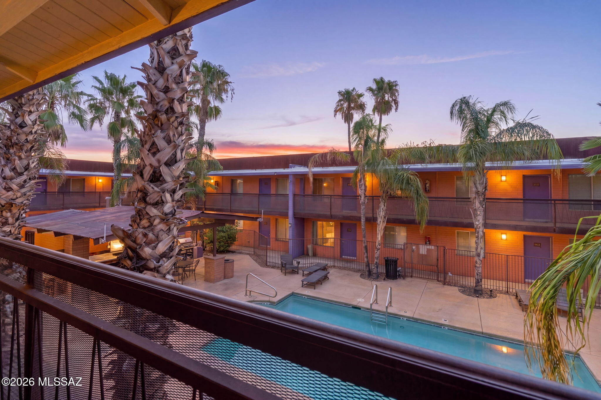 Experience effortless living in this beautifully maintained two-story condo in the gated 10th Street Condominiums, just minutes from the U of A. Whether you're a student, a parent looking to invest in your student's housing or an investor seeking a high-demand location, this 3-bed, 2-bath home is an outstanding opportunity. Why pay rent when you can own and build equity? All furnishings are available by separate sale, creating an exceptional turnkey option. Interior features include durable concrete flooring, Alder cabinetry, granite countertops, stainless appliances, updated baths, a stackable washer-dryer, and a newer A/C. Secure gated access, landscaped grounds, a sparkling pool, and BBQ area round out the package. Don't miss this exceptional opportunity! Additional photos to follow.