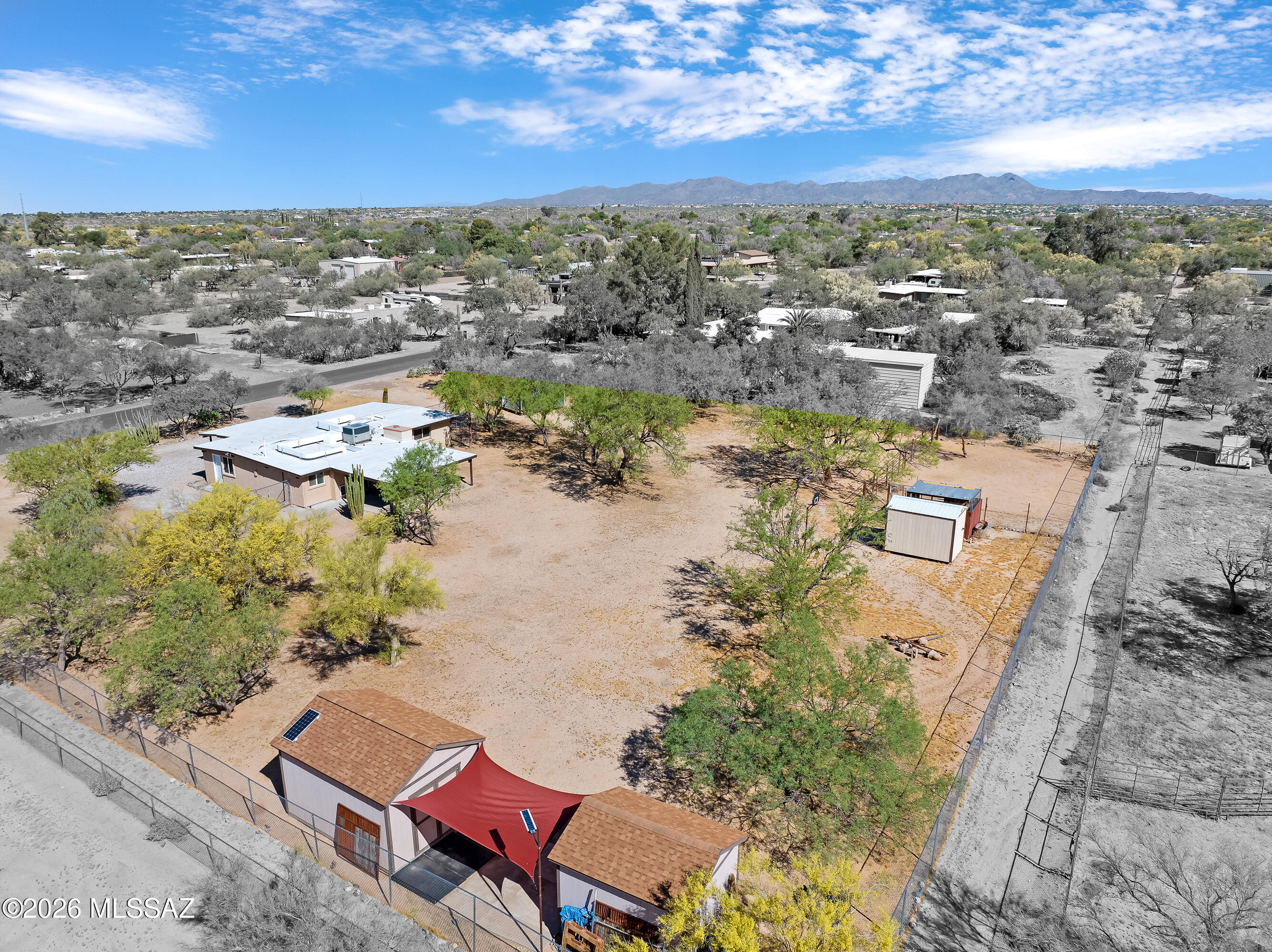 Charming ranch-style home in Northwest Tucson offering space, comfort, and true Southwest living. This 4-bedroom, 3-bath home includes a newly added third bathroom, providing extra convenience and functionality. The interior features brand-new tile flooring throughout and a bright, welcoming layout that's completely move-in ready. Situated on horse property with NO HOA, this home is ideal for those seeking room to spread out and enjoy the outdoors. Recently installed panel fencing created a dedicated pasture area, perfect for horses or other animals. Enjoy direct access to the CDO trail for easy, scenic riding right from your property, along with stunning desert and mountain views in every direction. Combining peaceful rural living with close proximity to Tucson amenities.