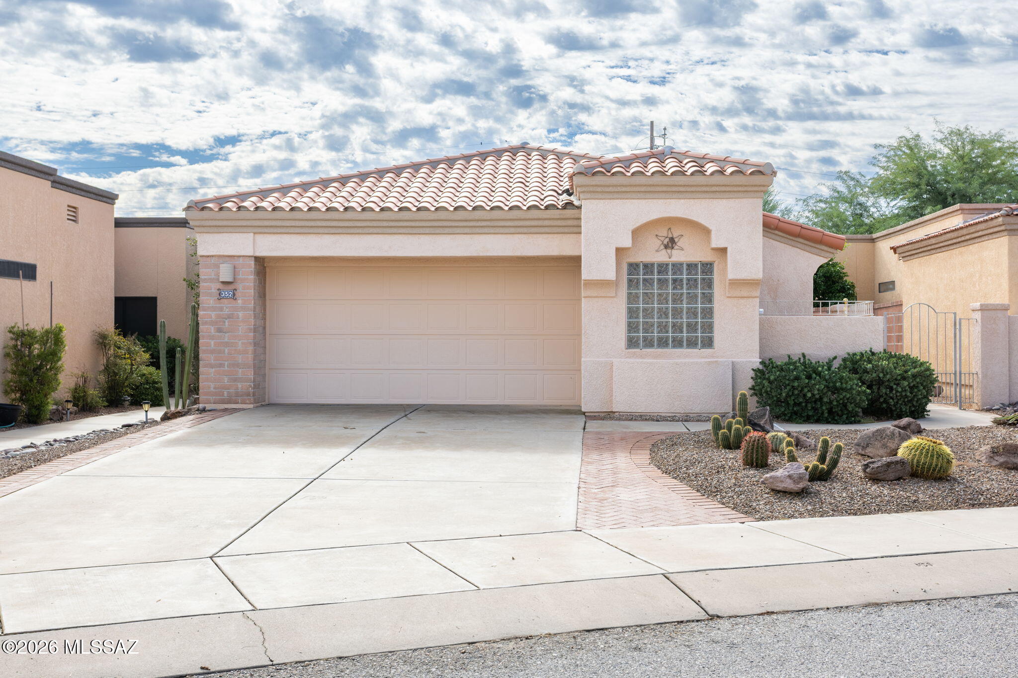 Rare perimeter lot in the Las Campanas neighborhood of Solano.  Walk to the full service GVR center within a few blocks.  This 2 bedroom/2 full bathroom single family home (no shared wall!) features hard flooring throughout, high ceilings, with a split plan.  Enjoy the privacy and mountain views from the main living areas and the Arizona Room.  A bonus room can be an office or a crafts area.  Large 2 car garage with storage cabinets.  Minutes away from all Green Valley amentities.