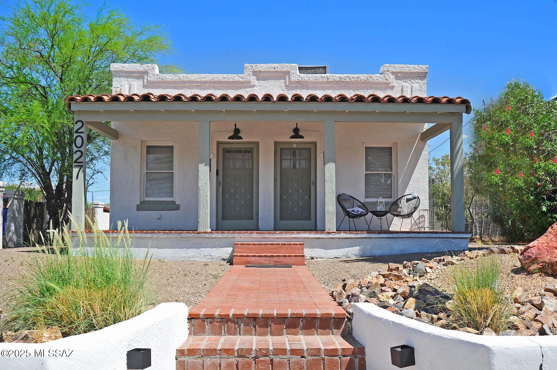 Pre-Leasing for August. 
Step into the perfect blend of vintage charm and modern convenience with this beautifully maintained 4-bedroom, 2-bath home in the heart of Tucson's highly sought-after Sam Hughes neighborhood.
Features You'll Love:
- Spacious 1,372 sq ft layout with original wood floors and door trim, preserving the home's historic character
- Furnished - everything shown in the photos is included!
- Remodeled bathrooms for a fresh, contemporary feel
- Decorative fireplace adds warmth and charm to the living space
- Central A/C to keep you cool all summer long
- Full-size washer and dryer for your convenience
- Vintage sage green tile counters and a gas stove in the kitchen, complemented by modern, ceiling-height cabinets
- Every room wired for internet perfect for working or streaming from home
- Front porch for relaxing or entertaining
Parking:
- On-street parking requires a permit
Location:
- One Block from the University of Arizona
- Nestled in the historic Sam Hughes neighborhood, known for its beautiful tree-lined streets and vibrant community

Tenant to pay an additional $200/month that will cover Internet/Water/Sewer/Trash Services.

Don't miss your chance to live in a home that combines timeless style with all the modern amenities you need within walking distance to the University of Arizona. This home is offered as NON-SMOKING. Small dogs, less than 2 will be considered by landlord. No cats.