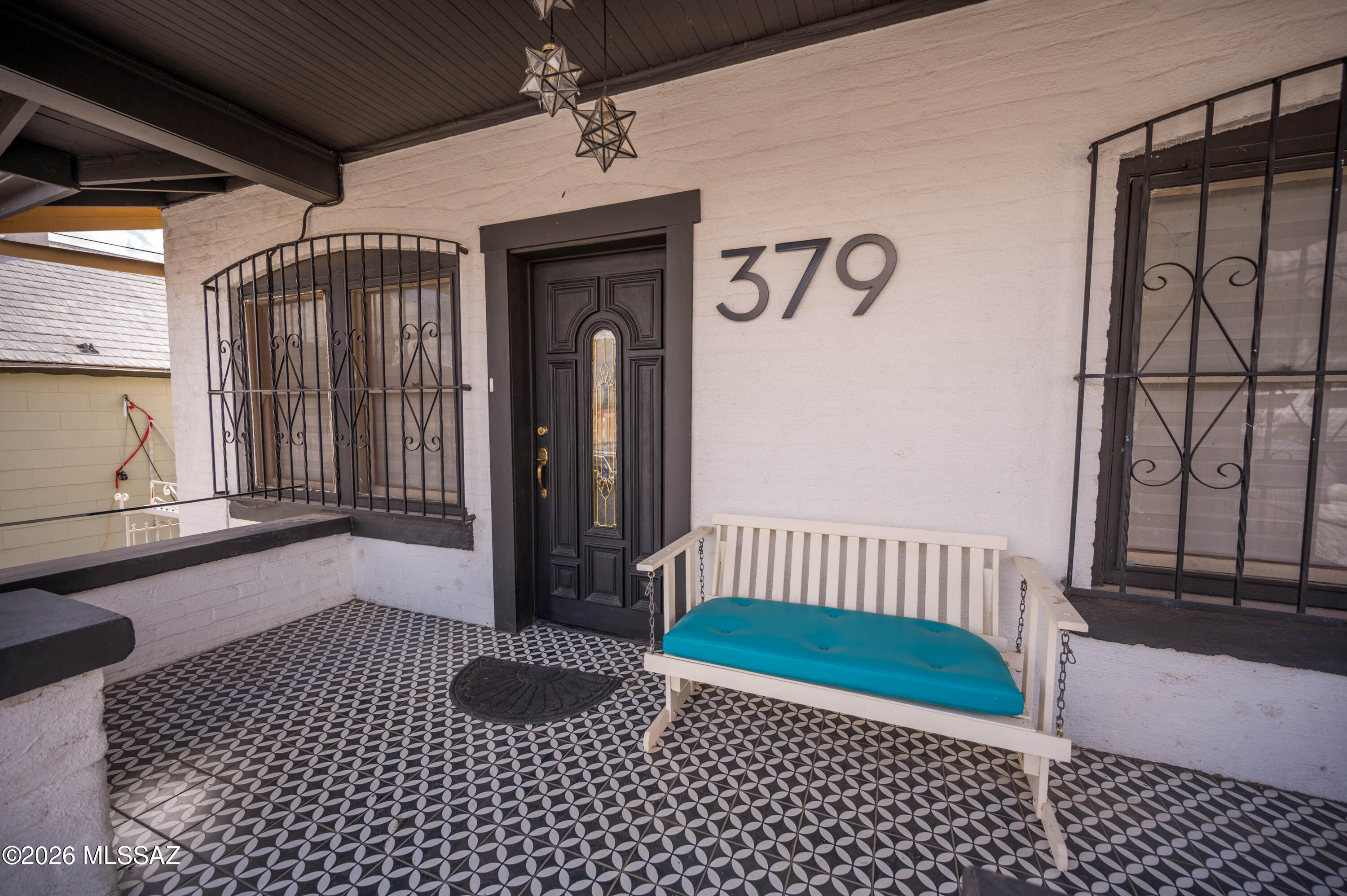 Charming and tastefully remodeled home located in the historic Nogales area. This 4-bedroom, 3-bath residence blends timeless character with modern upgrades. Features include a beautifully updated kitchen with custom cabinetry, granite countertops, stainless steel appliances, and abundant natural light. Original wood flooring adds warmth, while unique designer finishes create a distinctive and inviting atmosphere. Spacious living and dining areas are perfect for entertaining. Enjoy a private deck with stunning city views. Elevated front entry enhances privacy and curb appeal. Conveniently located near the border, shopping, dining, and essential services. A truly one-of-a-kind property full of style and character.