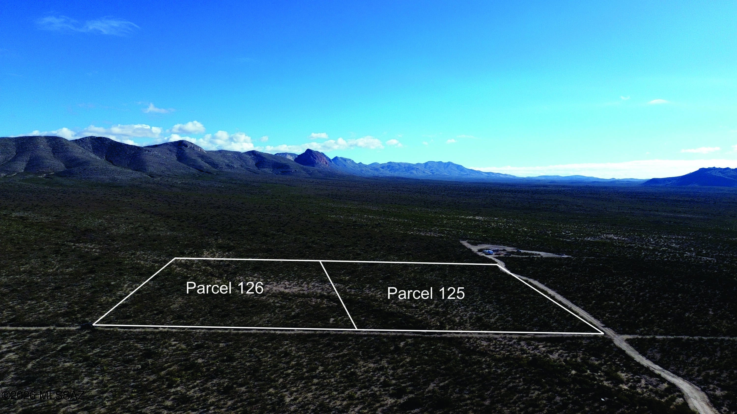 This is a vacant 4.79-acre parcel in the Valley Springs 06 subdivision. It offers a quiet corner of southeastern Arizona's high-desert landscape, ideal for those seeking a personal retreat or a base for outdoor adventure. The property sits near Douglas, a historic border town, with the Mule Mountains to the west and the more distant Chiricahua Mountains offering a dramatic backdrop for enjoying the region's unique ecosystem and expansive views. Short drive to all of Cochise counties historic sites. Seller financing is available with $2900 Down plus Pioneer Title account setup and closing Costs, for 3 years at 9.9 percent interest. with a payment of $257.76 per month plus Pioneer Title Processing fee and impounded property tax