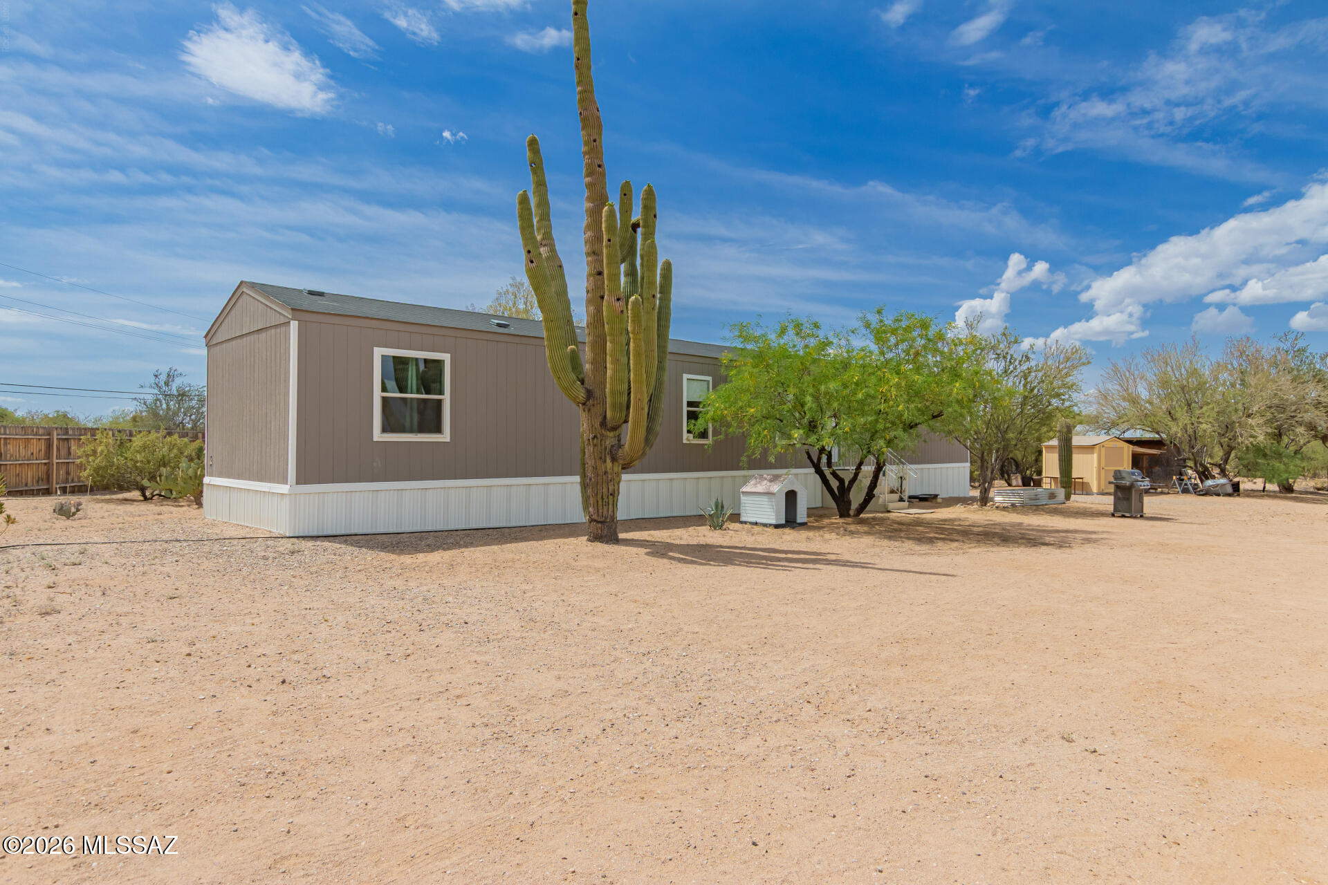 3 bed, 2 bath manufactured home with 1,152 sq ft on a 1-acre horse property in Picture Rocks. Located just minutes from Saguaro National Park, this property offers the space and flexibility to enjoy desert living with room for horses, trailers, toys, or future improvements. The home features a functional layout, open outdoor space, and plenty of potential to make it your own. Enjoy privacy, scenic surroundings, and easy access to outdoor recreation, riding, hiking, and more. A great opportunity for country-style living with convenience to Tucson and Marana amenities.