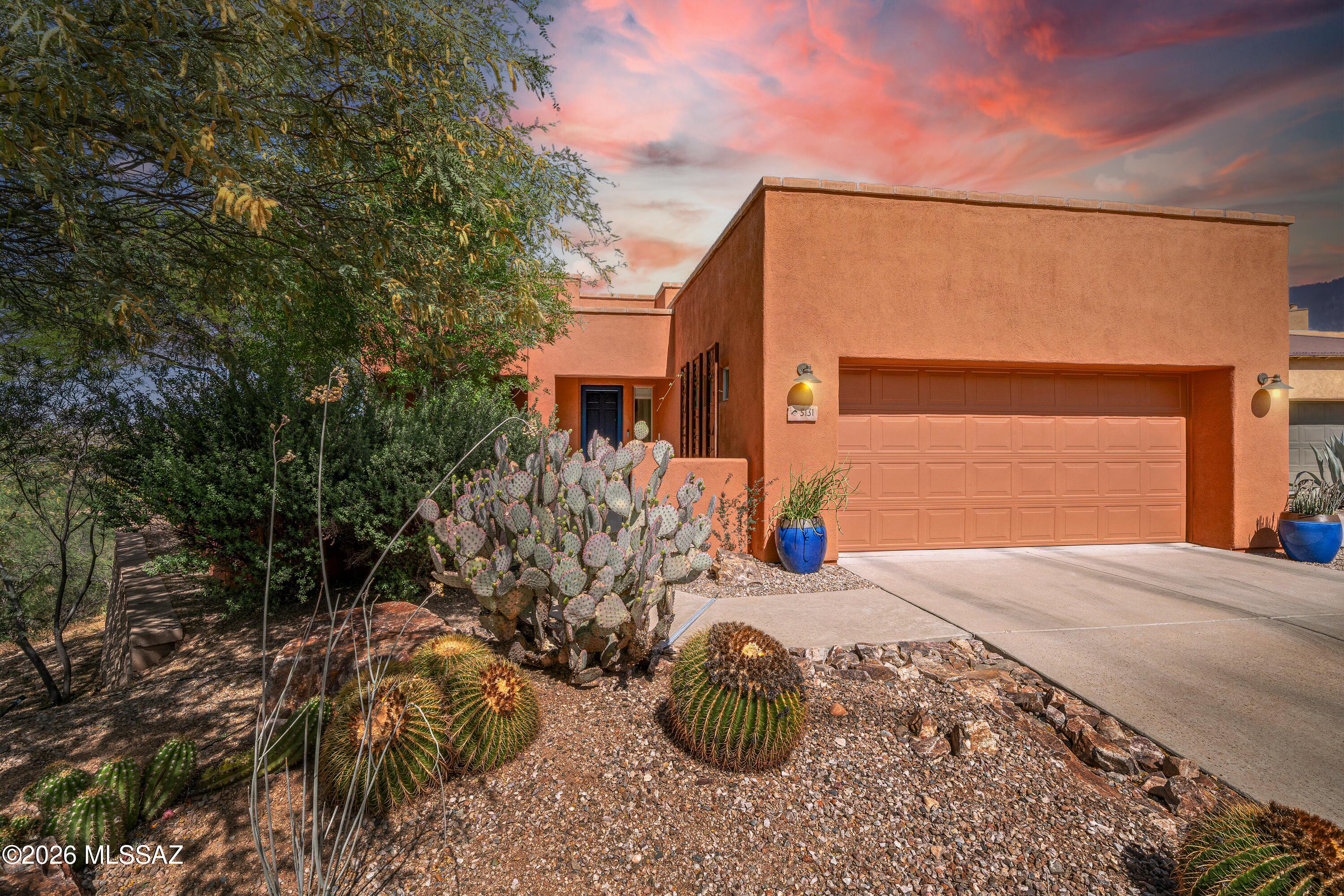 3 bed, 3 bath + den/office in the sought-after Civano community! This home offers abundant natural light with numerous windows & transom accents, tile flooring throughout plus a spacious kitchen with double ovens, a gas cooktop, and island that overlooks the great room with gas fireplace. Enjoy the benefits of fully OWNED SOLAR, a water cistern for added efficiency & many ''smart'' home features! Beautifully landscaped yards with incredible mountain views, multiple patios create ideal spaces to relax & take in the peaceful surroundings. No neighbors on one side--just open land for added privacy. Meticulously maintained, this home shows true pride of ownership and is in pristine, move-in ready condition. Civano offers 2 pools, parks, sports courts, walking trails, a nursery & more!