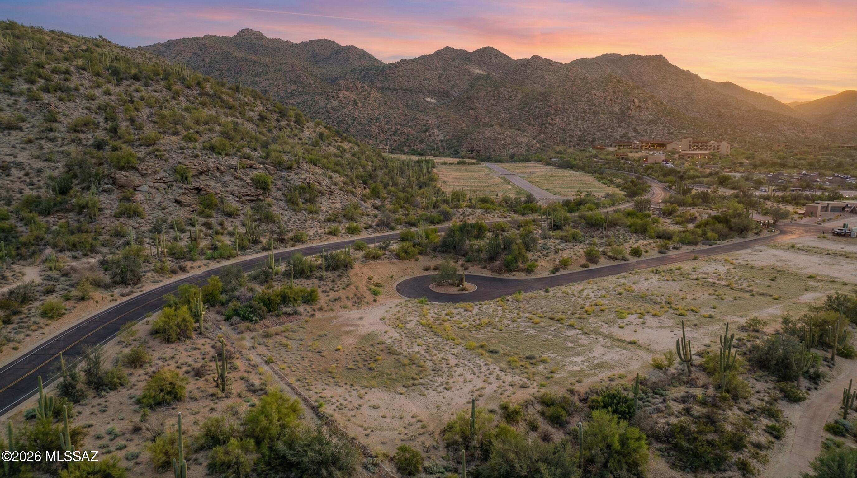 Exceptional corner homesite offering generous space, enhanced privacy, and expanded design possibilities in the newest enclave of The Ritz-Carlton Residences, Dove Mountain. This stunning property offers unmatched golf course, mountain & sunset views. 

Enjoy the convenience of being within walking distance to The Ritz-Carlton, Dove Mountain, with access to world-class dining, spa services, golf, and resort amenities. An exceptional opportunity to create your custom retreat in one of Southern Arizona's most prestigious communities.

Homeowners enjoy access to amenities, concierge services, social events, club membership and more!