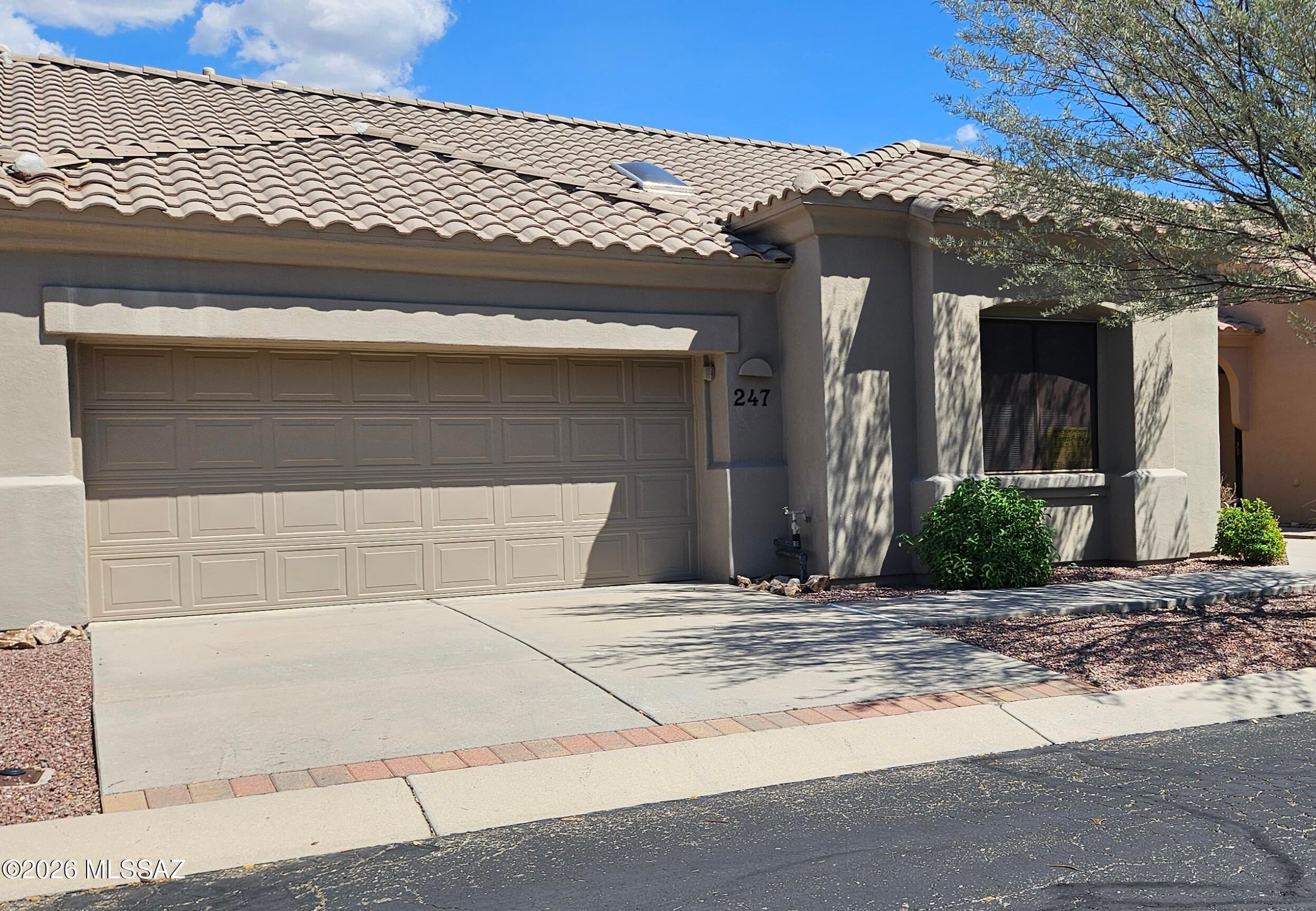 Conveniently located just 3.5 miles from Oro Valley Hospital. this 2-bedroom plus den/office, 2 bath town home in desirable Vistoso Village sits on a corner lot with spectacular mountain views! Skylight brightens the office/bedroom.

What truly sets this home apart is the patio. Unlike most homes in the neighborhood, this property has a luscious view of the Catalina Mts for you to unwind on your private patio.

Inside you'll find an open floor plan that features beautiful tiled floors, entire inside freshly painted, (except garage) and bedroom carpets, closets freshly steamed cleaned and sanitized.  A state-of-the-art water softener provides sparkling clean water.

This one owner home is chock full of pull-out cabinets in the kitchen and a huge pantry with additional room for storage The reasonable HOA fee is a bargain as it includes water, roof, exterior paint, all exterior maintenance front and rear, Xfinity high speed internet and cable tv, termite treatment, year-round heated community pool. spa and lap pool, clubhouse, hobby activities, barbeque grills! This lock and leave home gives you the freedom to enjoy a carefree life

Your next chapter begins in a welcoming, vibrant community dedicated to making life fun, fulfilling and chock full of opportunities! 

VISTOSO VILLAGE: A VIBRANT 55+ACTIVE ADULT COMMUNITY
Located in picturesque Oro Valley, Vistoso Village is an intimate, lock-and-leave gated community offering an unparalleled living experience for active adults. 

With just 263 homes, and 5 different appealing models, our residents enjoy a peaceful, private setting with the opportunity to participate in a variety of engaging activities. Vistoso Village fosters a vibrant, friendly atmosphere where residents can connect, create and thrive!

This is a lock and leave, gated, adult 55 and older community. Secure, safe and quiet!