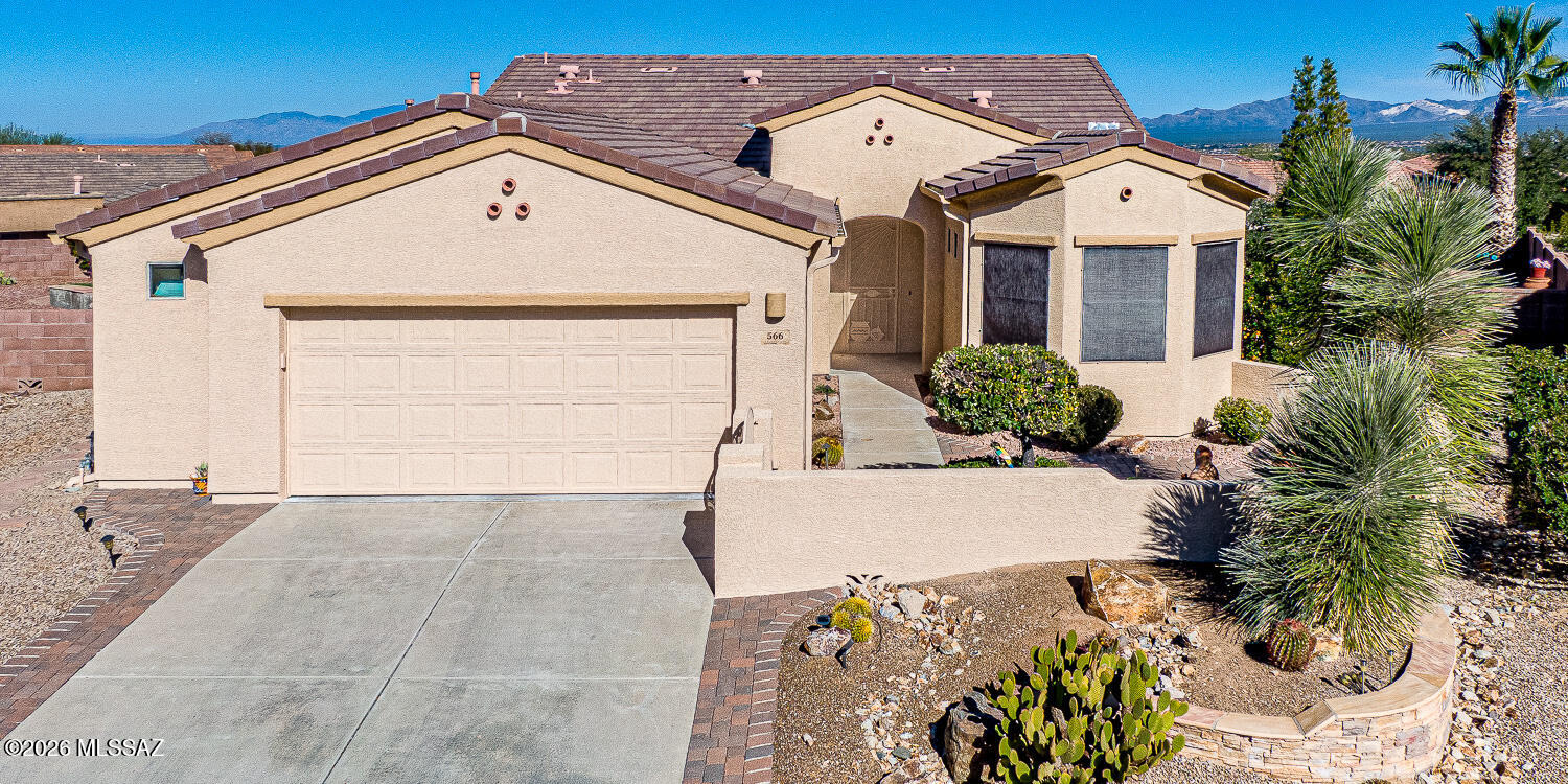 Beautiful Las Campanas Home in the heart of Green Valley, an Impressive Front Courtyard as you enter, this home has Mountain Views and a Great Room, 2 Bedrooms (Split), Open Den, Office and a large 2 1/2 Car Garage. Many great interior features: Tile Floors thought-out, gas range, ceiling fans, built-in cabinets, just too many features to list them all. A very private rear yard that would be great for entertaining, (Mountain Views), it even has it own private putting green and a cornhole court.   This home comes completely Furnished (all furniture, furnishing, tools, etc.) Must See!