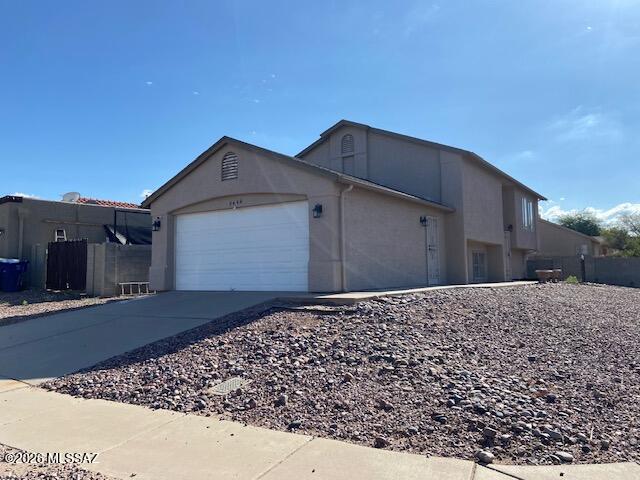 3 bedroom, 2 bath split level home on a corner lot.    Master suite with walk in closet.  Split bedroom plan.  Family room, living room and bonus room provide nice living areas.  Good sized kitchen with eat in area.  Covered porch off of eat in area.  2 car garage.  Large laundry room.    This property is a fix up but lots of value here.  Take a look.