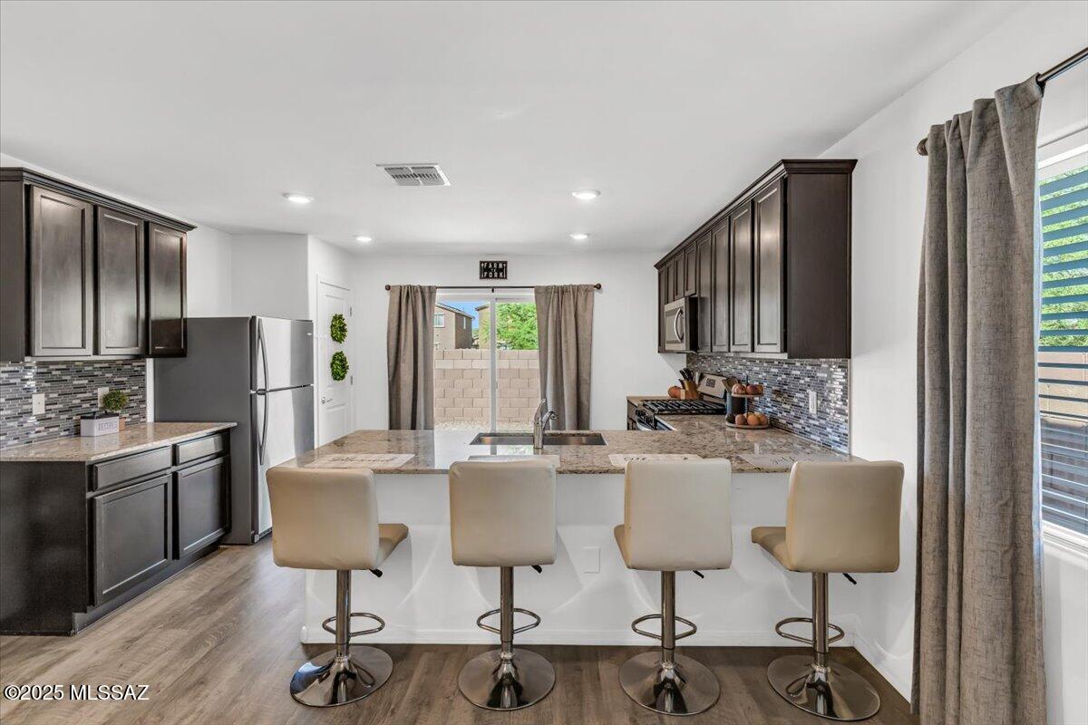 Built in 2022, this beautifully maintained 3-bedroom, 2-bath home blends modern style with everyday comfort. Located in the highly sought-after Marana School District, it's an ideal fit for families, first-time buyers, or anyone looking for a newer, truly move-in-ready home.

Enjoy a prime homesite next to the community park, perfect for morning walks, playtime, and weekend gatherings , plus added privacy with only one neighboring property.

Inside, the open-concept floor plan is designed for easy living, featuring spacious bedrooms with a split floor plan, a bright and inviting kitchen, and contemporary finishes throughout. This home offers the perfect balance of location, privacy, and modern convenience.