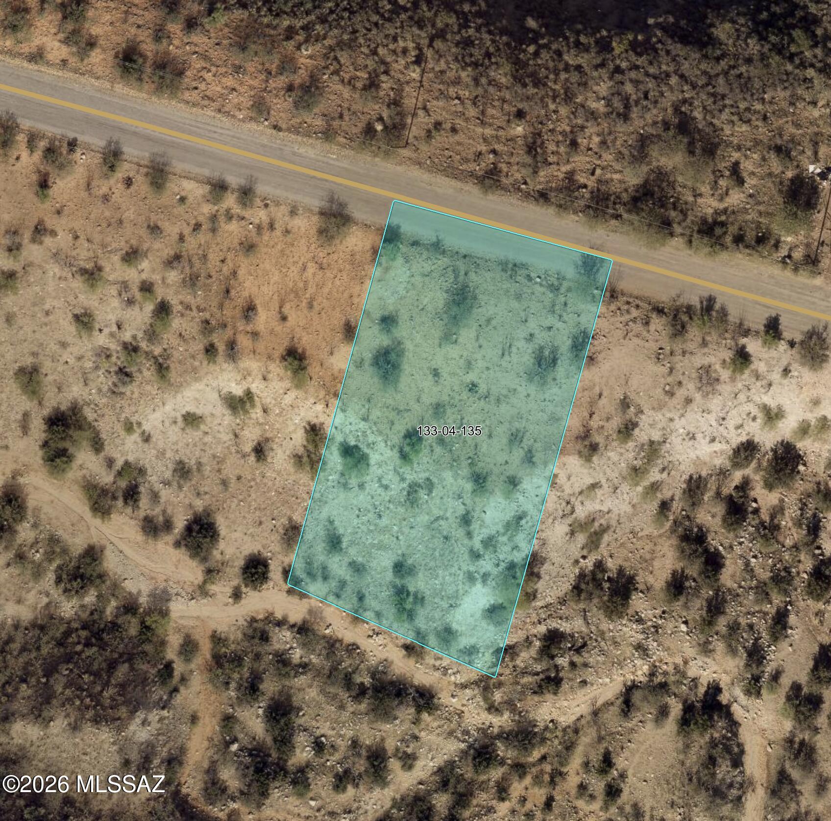 Over three quarters of an acre (0.78 ac) in Rio Rico Ranchettes on Avenida Calamar, a county-maintained street with new homes going up nearby. Zoned SCC R-2 for a single-family build with no HOA. The adjoining lot at 1679 Avenida Calamar (0.51 ac) is also offered by the same seller, so you can buy both for 1.29 acres side by side. Close to Pendleton Dr and I-19 for an easy drive to Nogales, Tubac and Tucson. Buyer to verify water, electric, septic/perc and building requirements with the providers and Santa Cruz County. Seller financing may be considered.