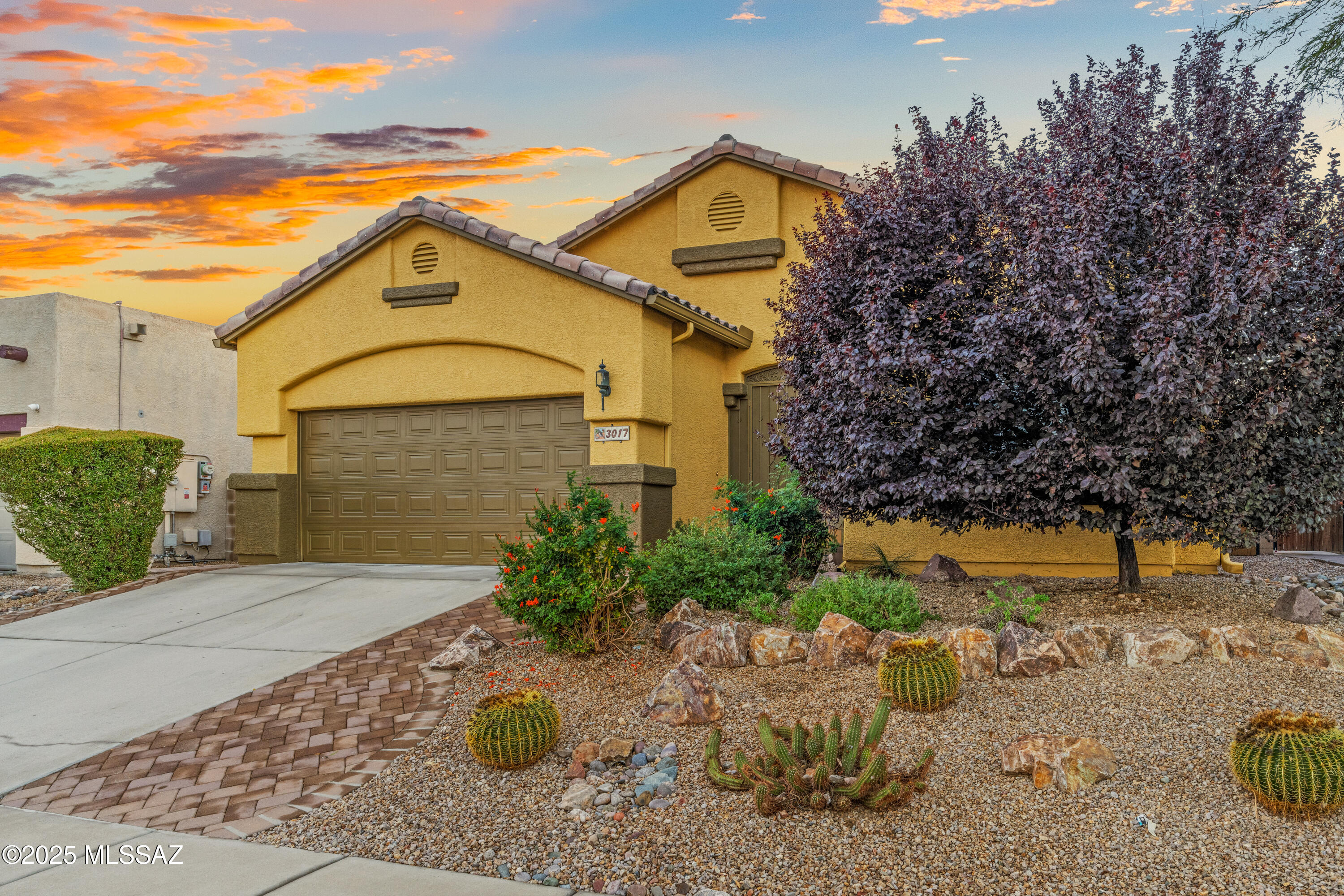 Beautifully updated and move-in ready, this 4 BD / 2 BA, 1,917 sq.ft. home is located in the desirable Desert Star community of West Tucson. Inside, you'll find a spacious family room with custom built-in shelving, a cozy fireplace, and stylish tile flooring throughout no carpet anywhere. The chef's kitchen is a standout feature, offering quartz countertops, white cabinetry, a walk-in pantry, a large island with breakfast bar seating, modern tile backsplash, and stainless steel appliances. The generous primary suite includes a fully upgraded bathroom with a double vanity, walk-in tiled shower, dedicated makeup vanity, towel storage, and an oversized walk-in closet. Three additional guest bedrooms share an updated hall bath, providing comfortable space for family, visitors, or...