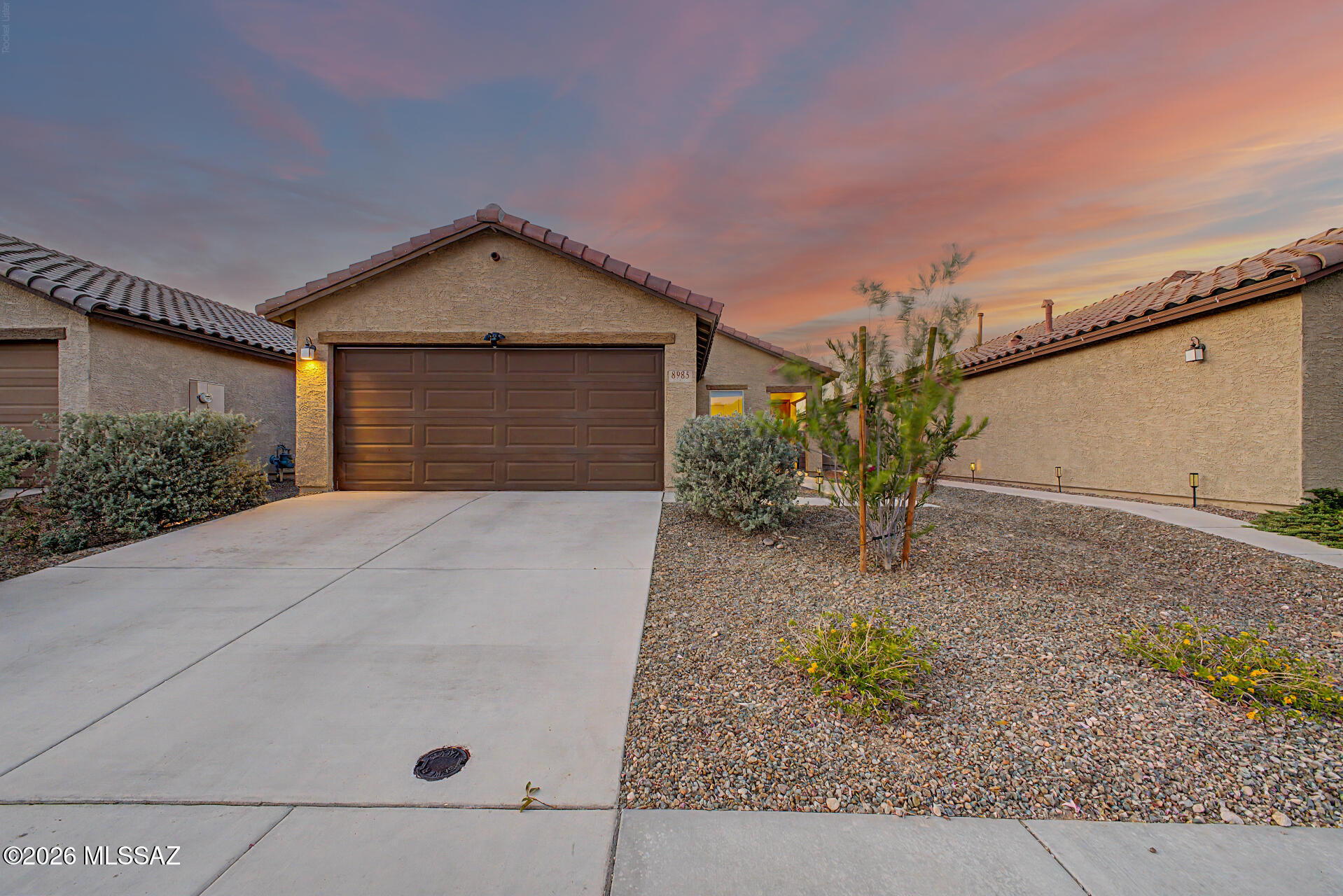 Beautiful 3-bedroom, 2-bath home located on Tucson's East side in a newer build community featuring parks, dog parks, and walking paths. This turn-key, home offers an open-concept floor plan with spacious living areas designed for both everyday comfort and entertaining. The kitchen flows seamlessly into the main living and dining spaces, creating a bright and inviting atmosphere throughout the home.
Conveniently located just minutes from Davis-Monthan Air Force Base, Saguaro National Park East, grocery stores, restaurants, shopping, and other everyday amenities, this home offers easy access to both outdoor recreation and city conveniences. Enjoy low-maintenance living in a growing East side community with nearby parks and scenic desert surroundings. Make this home yours today!