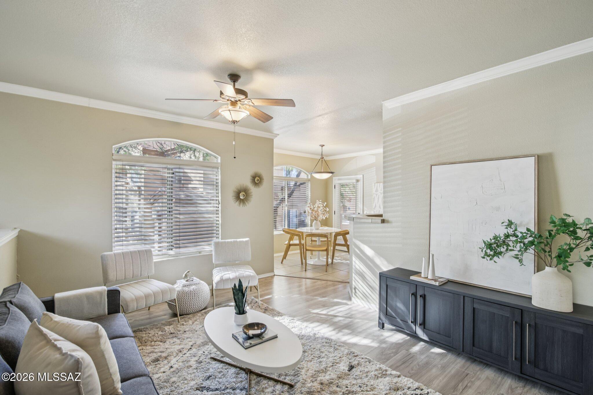 Rare 3-bed, 2-bath upstairs unit with a 1-CAR GARAGE in walkable, gated Pinnacle Canyon Condominiums. Ground level entry w/ interior stairs. NO CARPET Engineered wood & ceramic tile. Filled w/ natural light, this private residence offers a spacious floor plan & a covered patio with a storage closet. Resort-style amenities include a palm-shaded pool & spa w/ waterfall, fitness center, community & business center, meeting rooms, large grassy area perfect for dogs, picnic areas w/ BBQ.  Prime Foothills location near Sabino Canyon & Ventana Canyon w/ easy access to shopping, dining, golf, spas, & everyday conveniences. Walkable to nearby stores, cafés & restaurants. Move-in ready opportunity for low-maintenance Foothills living. Highly rated District #16 schools