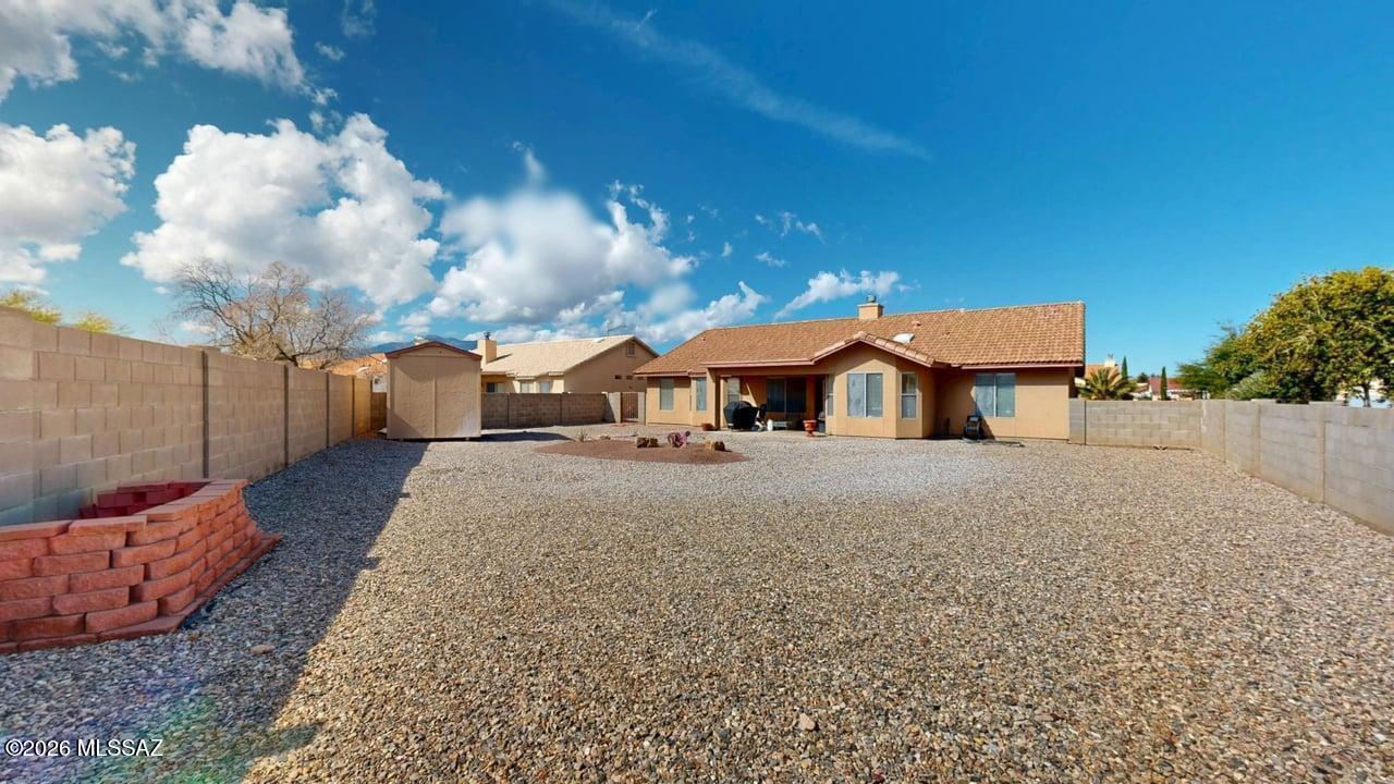 Step into this beautifully maintained, single-owner split floor plan home offering 3 bedrooms, 2 bathrooms, and a 2-car garage. The spacious primary suite features a private en-suite bathroom complete with a separate shower and soaking tub.

The bright, well-appointed kitchen is filled with natural light and includes a charming breakfast nook--perfect for casual dining. Two additional bedrooms and a full guest bathroom provide ample space for family and visitors.

Enjoy both a formal living room and dining room, ideal for entertaining or hosting gatherings. Outdoors, the property features a well-maintained, low-maintenance yard and a fully fenced backyard, offering privacy and a relaxing setting for family and friends. A generously sized storage shed adds extra functionality, perfect for hobbies or additional storage.
