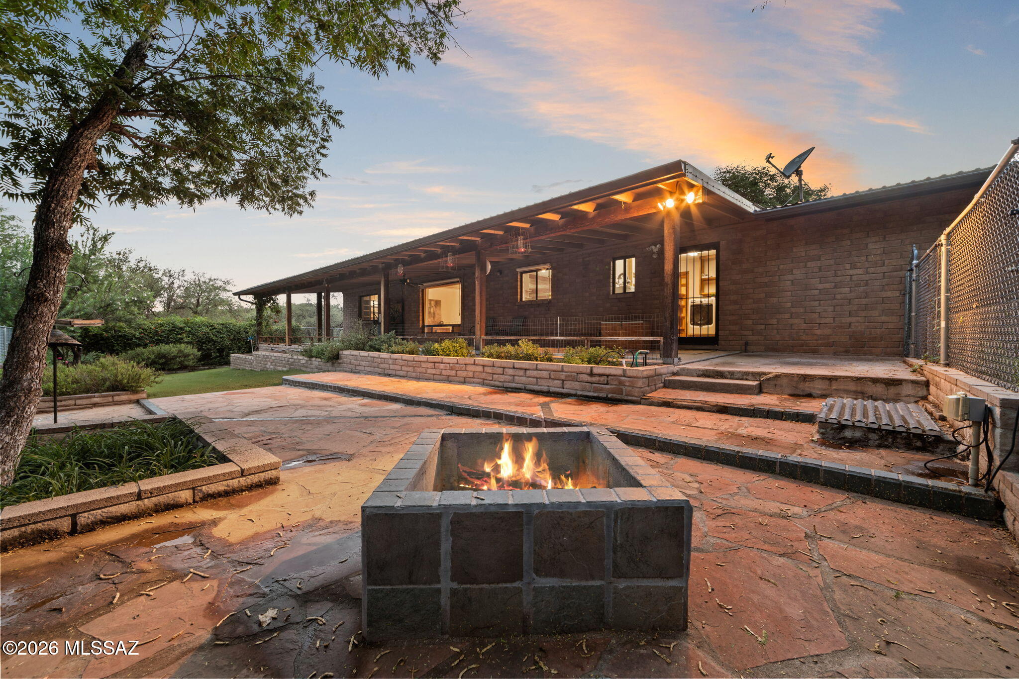 Tucked into 11 acres of rolling hills and mature oak trees, 13 Hog Canyon Road offers the privacy, character, and natural beauty that make the Patagonia/Sonoita area so special. With views of Sonoita Creek and a peaceful setting this is a property made for those looking for a little more room to breathe.
The 3bed/2bath block home offers a comfortable and functional floor plan with a dedicated mudroom, walk-in pantry, and multiple storage rooms, providing plenty of space for everyday living, hobbies, and all the extras that come with country life.
A standout feature of the property is the newer, heavily insulated workshop/RV garage, offering exceptional space for projects, equipment, storage, or a dedicated workspace.