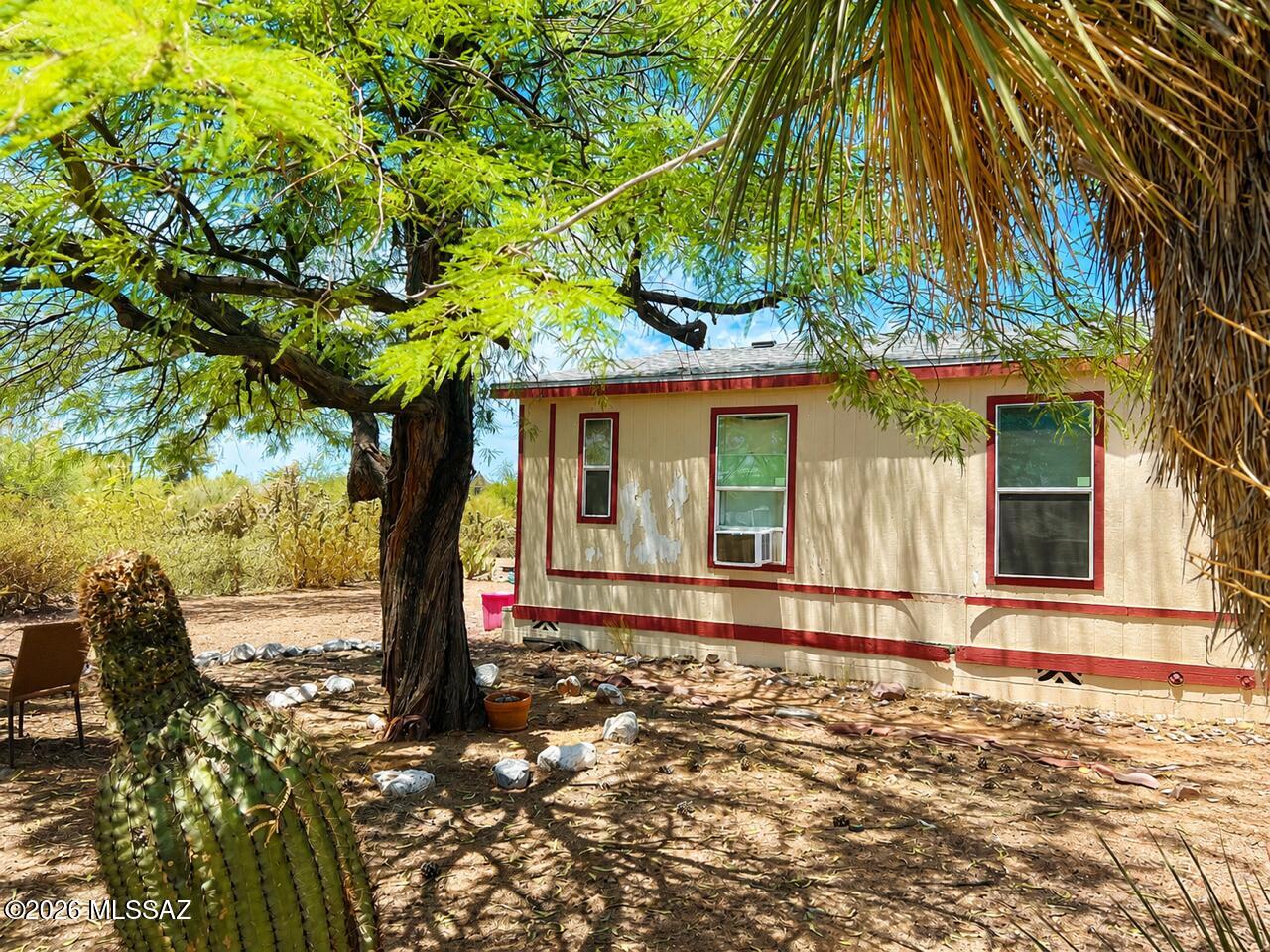 Rare Opportunity in Picture Rocks: Situated on ~1 acre w/ mountain views and near picturesque Saguaro National Park, this manufactured home offers exceptional potential for investors, flippers, contractors, or anyone seeking their next renovation project. Current owner began renovations, but was unable to complete, creating an opportunity to finish the transformation and realize the property's full potential. With 1,848 sqft of living space and room to reimagine, the value lies in the combination of location, land, and future potential. Buyers are encouraged to evaluate the property's potential firsthand during a scheduled Preview Event: Friday, 7/3 @ 11A. Come explore the possibilities, assess the opportunity, and envision what this property could become.