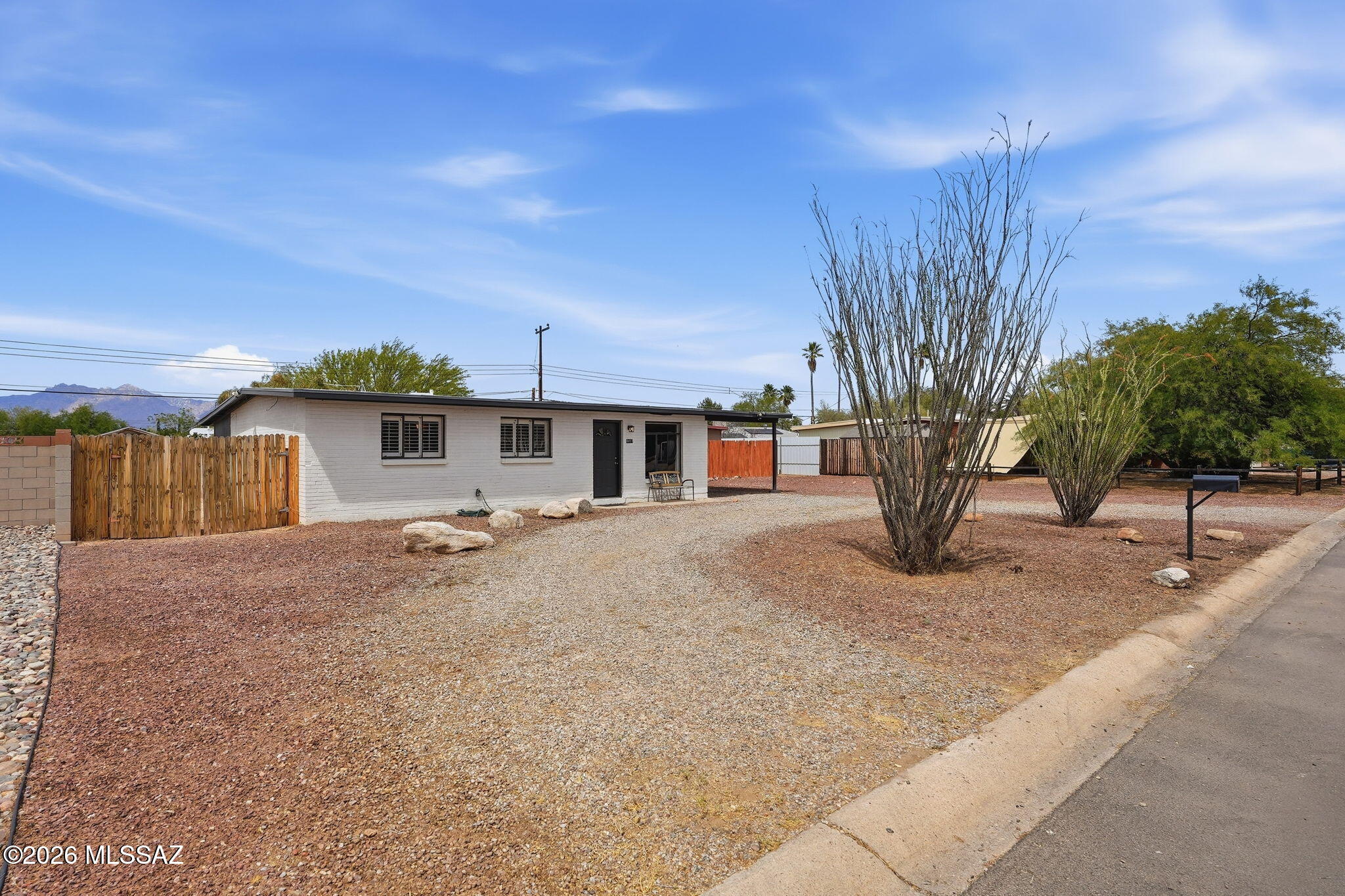 No HOA. Quarter-acre lot. Move-in ready. This 3 bed, 2 bath Tucson home delivers everything a first-time buyer is looking for without the compromise. Newer floors and fresh carpet mean you can unpack and enjoy from day one. The low maintenance yard keeps things simple, and two massive storage sheds set this property apart -- we're talking serious square footage for a workshop, extra storage, lawn equipment, or whatever your hobbies demand. Whether you're a hobbyist, a tinkerer, or just someone who finally wants a place for everything, these sheds are a game changer. Clean, solid condition throughout -- just bring your furniture and make it yours.