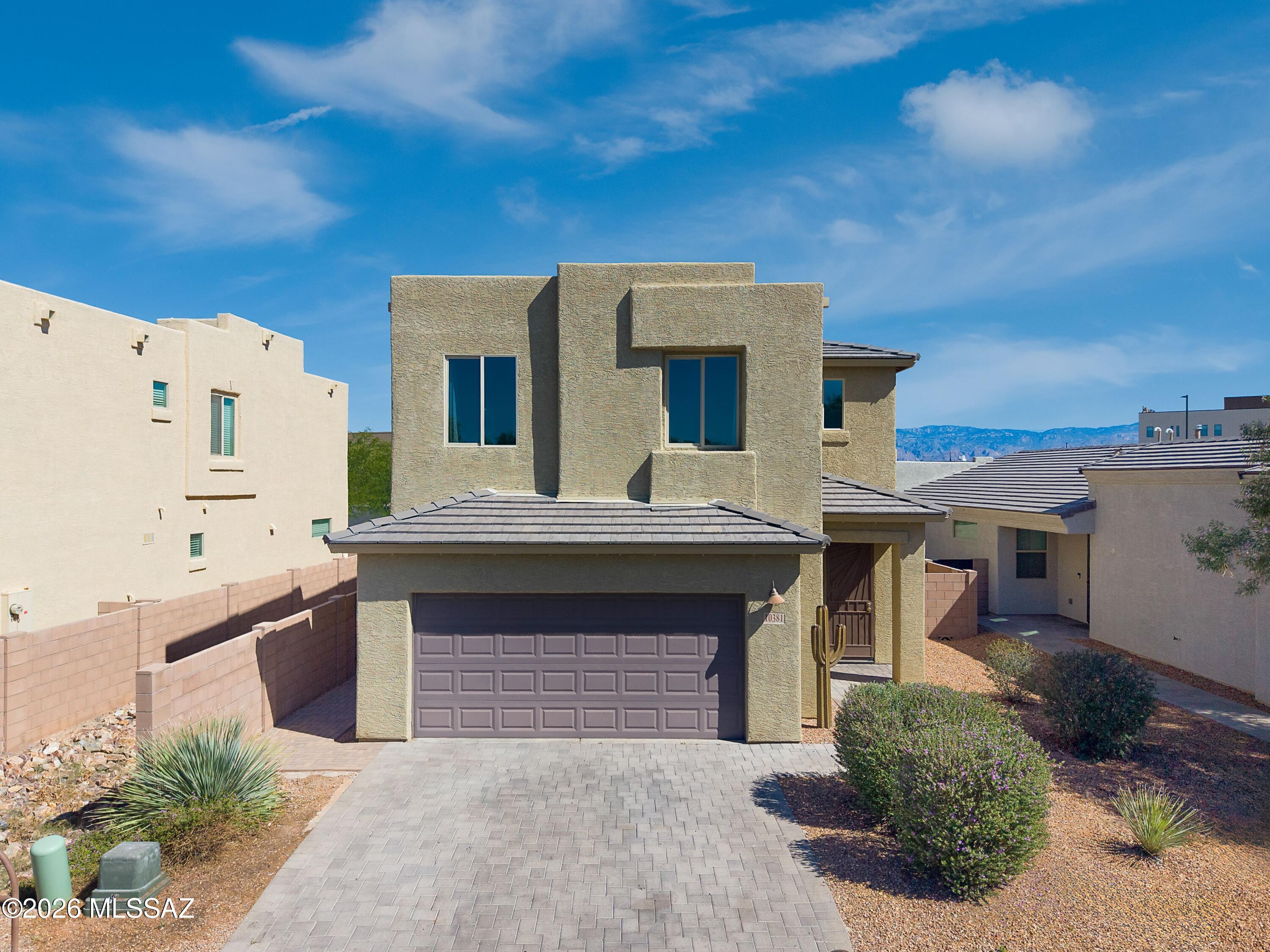 ASSUMABLE 2.375% VA LOAN! 3 BEDS/2 BATHS AND VIEWS!!  Welcome to your new home in the award-winning Vail School District! This stunning 2021 built home is located in the desirable  neighborhood of Sierra Morado which comes with bike/walking paths, parks, club house and community pool.  The downstairs has a great room design with living room, dining room and kitchen spaces together flowing to the backyard with covered patio, turf and pavers.  The upstairs has a loft, 3 bedrooms and 2 bathrooms.  Don't forget the Primary bedroom opens up to the deck with expansive views of the Catalina's and Saguaro National Park!!  Your 2 car garage has epoxy floor, water softner, overhead storage and an EV charger!  Oh and the home has solar to help with those power bills. This home is not to be missed!! >> Home selling points
>>
>>     Balcony off of master bedroom 
>>     Outlets galore in garage 
>>     Natural gas stub for natural gas grill
>>     Extended patio 
>>     Extended garage 
>>     Entire interior painted 
>>     Capable of Electric vehicle charging in garage with a 220v outlet 
>>     Oversized pantry 
>>     Upstairs loft with ability to be converted to 4th bedroom 
>>     Low maintenance backyard 
>>     Solar panels  
>>     Soft water system with hose bib so you can wash your car with soft water!
>>     Epoxy garage floor
>>     Dimmers in master bathroom and kitchen 
>>     2x6 construction 
>>     9' ceilings 
>>     Outlet in pantry for deep freezer / mini fridge 
>>     USB compatible outlet in master bedroom and kitchen island 
>>     Hideaway kitchen sink tilt drawer 
>>     Large tiled master shower
>>     Oversized walk in closet in master 
>>     Large bathroom window to enjoy Mountain View's