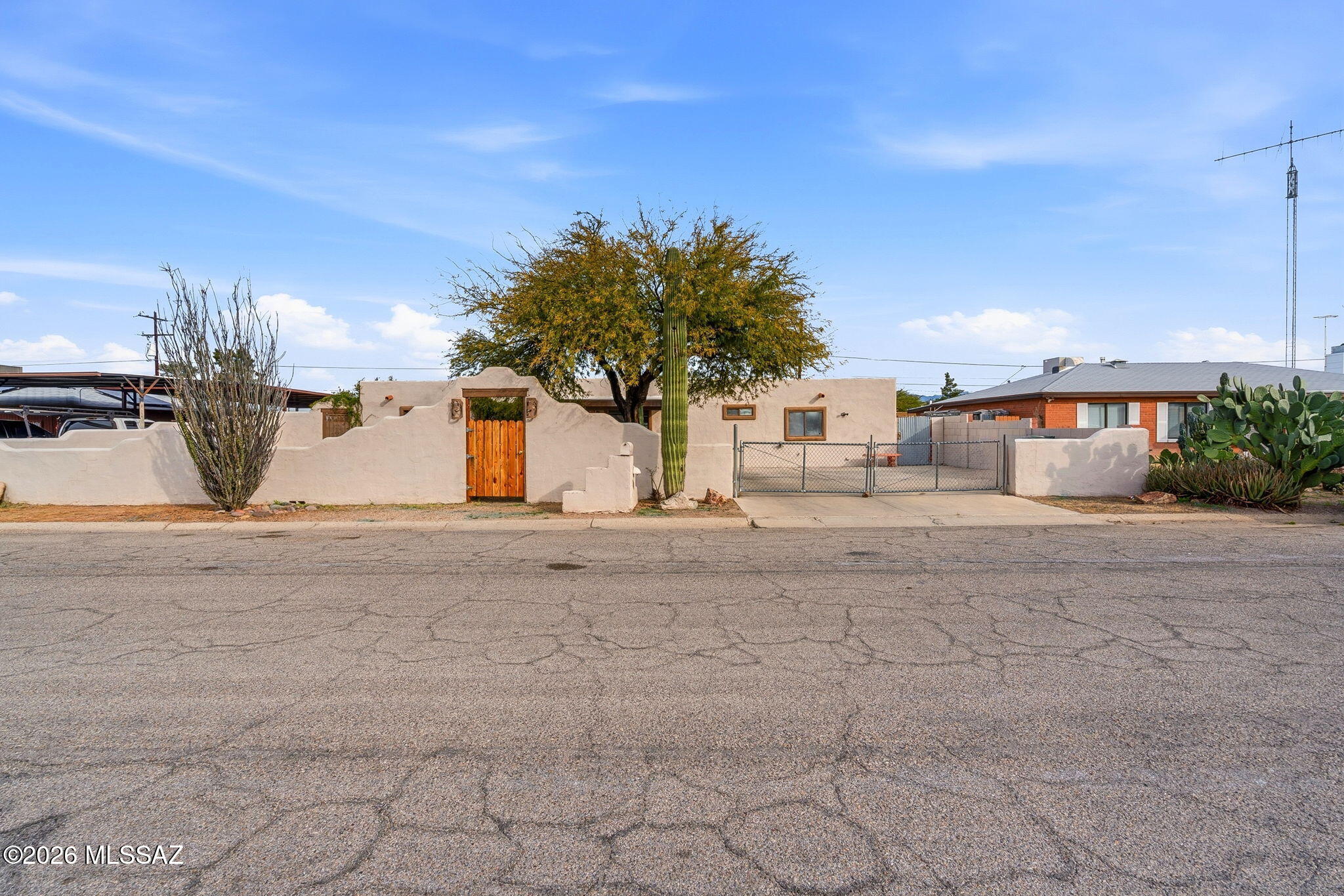 PRICED TO SELL! This is the crazy-good deal you have been waiting for! Bursting with beautiful curbside appeal, this Santa fe-style home sits on a large lot and offers endless potential for an investor or homebuyer ready to seize an opportunity. The Main home is full of character and the real showstopper is the separate guest quarters complete with full kitchen -perfect for rental income, multigenerational living, or hosting guests in style. Yes the home is being sold in AS-IS condition -but that's exactly why this deal is so special. With vision and a little TLC , this property could be one of the best investments you could make. Come take a look!