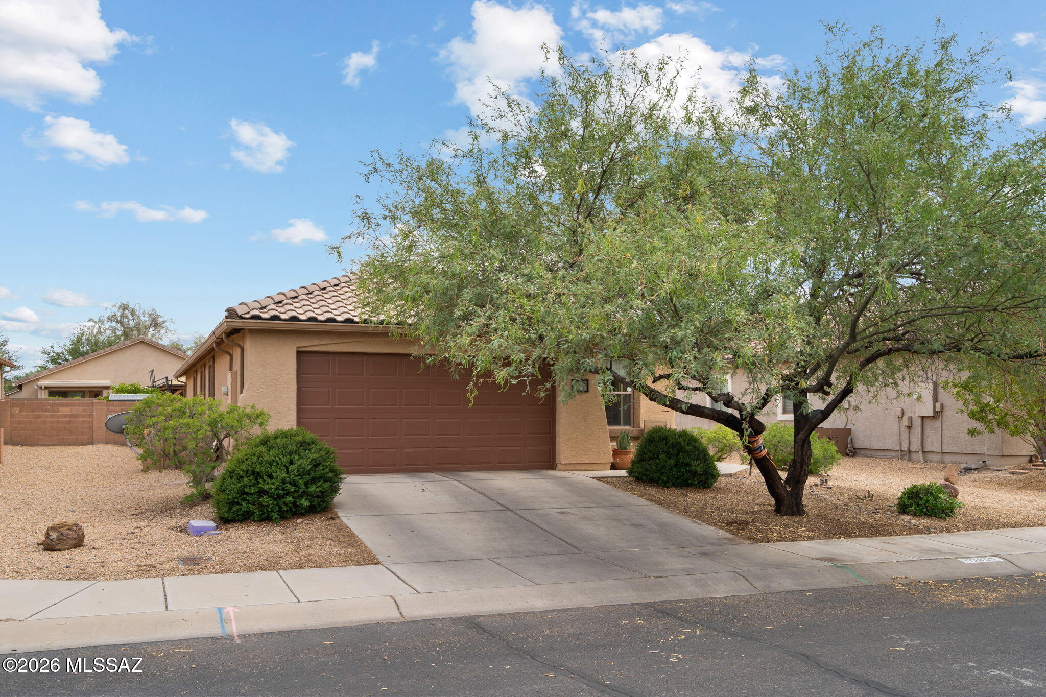 Discover comfortable, connected living in this inviting Gladden Farms home featuring 3 bedrooms, 2 bathrooms, and a versatile bonus room ideal for a den, home office, or playroom. The kitchen offers a spacious island and charming breakfast nook, creating a natural gathering place for everyday meals and conversation. Step outside to enjoy the screened-in back porch, flagstone patio, and low-maintenance turf--perfect for relaxing or entertaining. Conveniently located near a new grocery store, coffee shops, gas station, and car wash, this home blends flexible living spaces, outdoor enjoyment, and everyday conveniences.