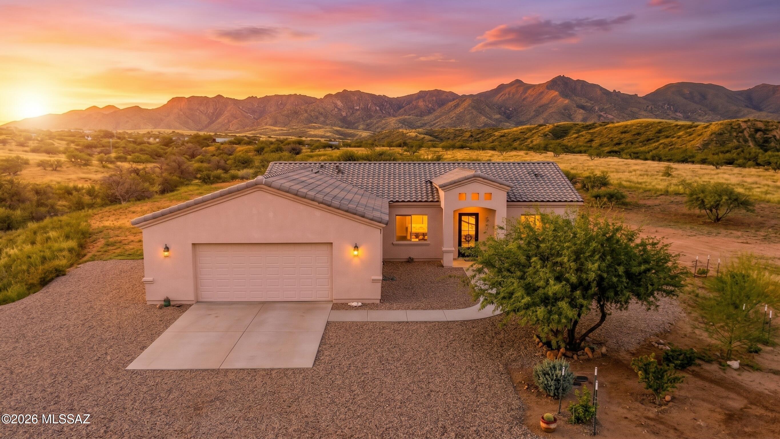 37.6 Acres Gentlemen's Horse Ranch: Welcome to PD Ranch, a breathtaking equestrian retreat that captures the very essence of wide-open Arizona living. Sprawling across an impressive 37.6 acres, this property offers a rare sense of scale and freedom, where the horizon feels like your own backyard and the rugged beauty of the desert landscape takes center stage.
Inside, the home is a sanctuary of light and space. The interior boasts an open, airy flow that makes daily life feel effortless, with large windows positioned to frame panoramic views and invite natural light to dance across the living areas. The kitchen serves as the heart of the home, offering ample counter space for slow morning coffee rituals or prepping a feast after a day on the trails. The primary suite is a generous getaway 37.6 Acres Gentlemen's Horse Ranch: Welcome to PD Ranch, a breathtaking equestrian retreat that captures the very essence of wide-open Arizona living. Sprawling across an impressive 37.6 acres, this property offers a rare sense of scale and freedom, where the horizon feels like your own backyard and the rugged beauty of the desert landscape takes center stage.
Inside, the home is a sanctuary of light and space. The interior boasts an open, airy flow that makes daily life feel effortless, with large windows positioned to frame panoramic views and invite natural light to dance across the living areas. The kitchen serves as the heart of the home, offering ample counter space for slow morning coffee rituals or prepping a feast after a day on the trails. The primary suite is a generous getaway designed for unwinding, while the additional bedrooms offer total versatility--perfect for a creative studio or a quiet home office.
While the home itself is inviting, the land is the true star. With over 37 acres of prime horse property at your fingertips, the possibilities for a rural lifestyle are endless. Whether you are dreaming of expansive stables, watching the sunset dip below the mountains from the saddle, or hosting lively evenings under a canopy of stars, PD Ranch provides the ultimate canvas for your equestrian ambitions.
Perfectly situated between the charm of Patagonia and the conveniences of Nogales, you get the best of both worlds. Plus, with Patagonia Lake nearby, you have easy access to boating, fishing, and lakeside recreation whenever the mood strikes. PD Ranch is more than just a home; it's a chance to embrace the soul of the Southwest. Come experience the scale and beauty of 28 San Gabriel Drive for yourself.