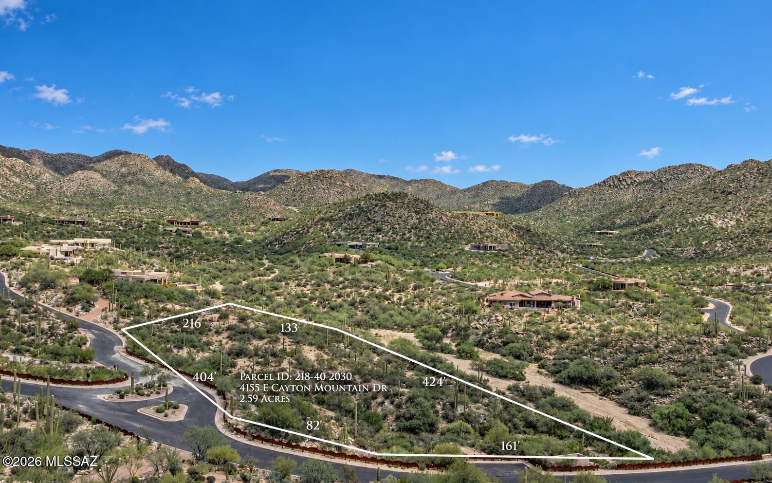 Fabulous custom lot set in guard gated Canyon Pass at Dove Mountain - surrounded by nature - saguaro studded land with rock outcroppings and mesmerizing panoramic views- nestled in and surrounded by the Tortolita Mountains.  This luxury home subdivision is filled some of the most stunning architectural designed custom homes. All homesites are on a minimum of 1 acre - with this lot resting at 2.59 acres.  Design your own custom home in a most magnificent venue.