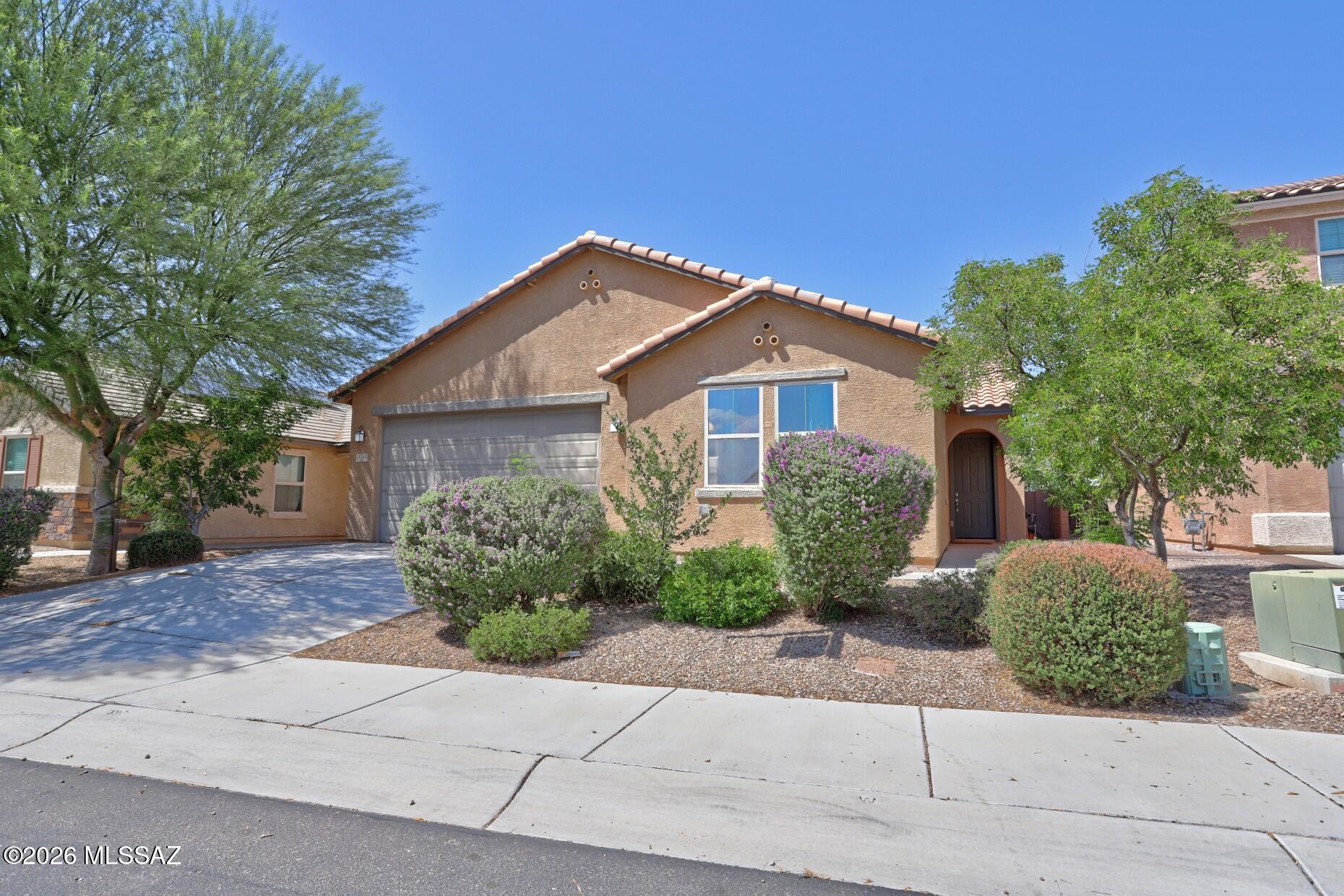 Lovely 4 bedroom, 2 bath home with 2 car garage in desirable Gladden Farms.  Well maintained and move-in ready!  Spacious kitchen with stainless steel appliances, ample cabinet space and granite counter tops.  Open-floor plan concept with recessed lighting, neutral colors and designer lighting in the dining area.  Primary suite with dual vanity and walk-in closet.  Split bedroom plan.  Hard flooring through-out.  Washer and dryer included.
Covered patio and landscaped back yard, Perfect for entertaining!