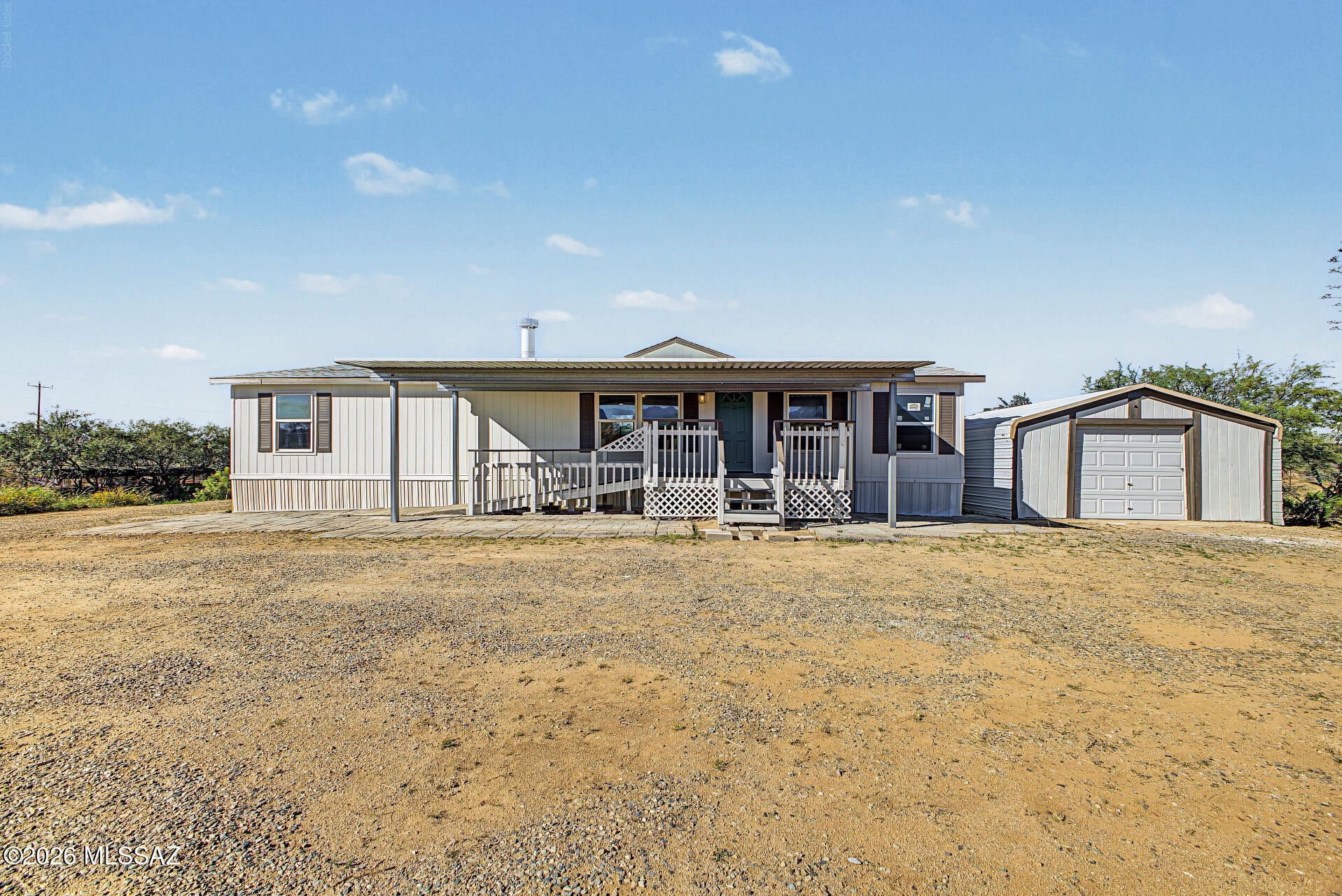 Welcome home to country living with a modern flair! This beautifully updated, fully affixed manufactured home in Benson offers the perfect blend of contemporary interior upgrades and expansive outdoor space. Featuring 3 bedrooms and 2 bathrooms, this turnkey property is situated on a generous lot of over an acre, offering peace, privacy, and endless possibilities.
