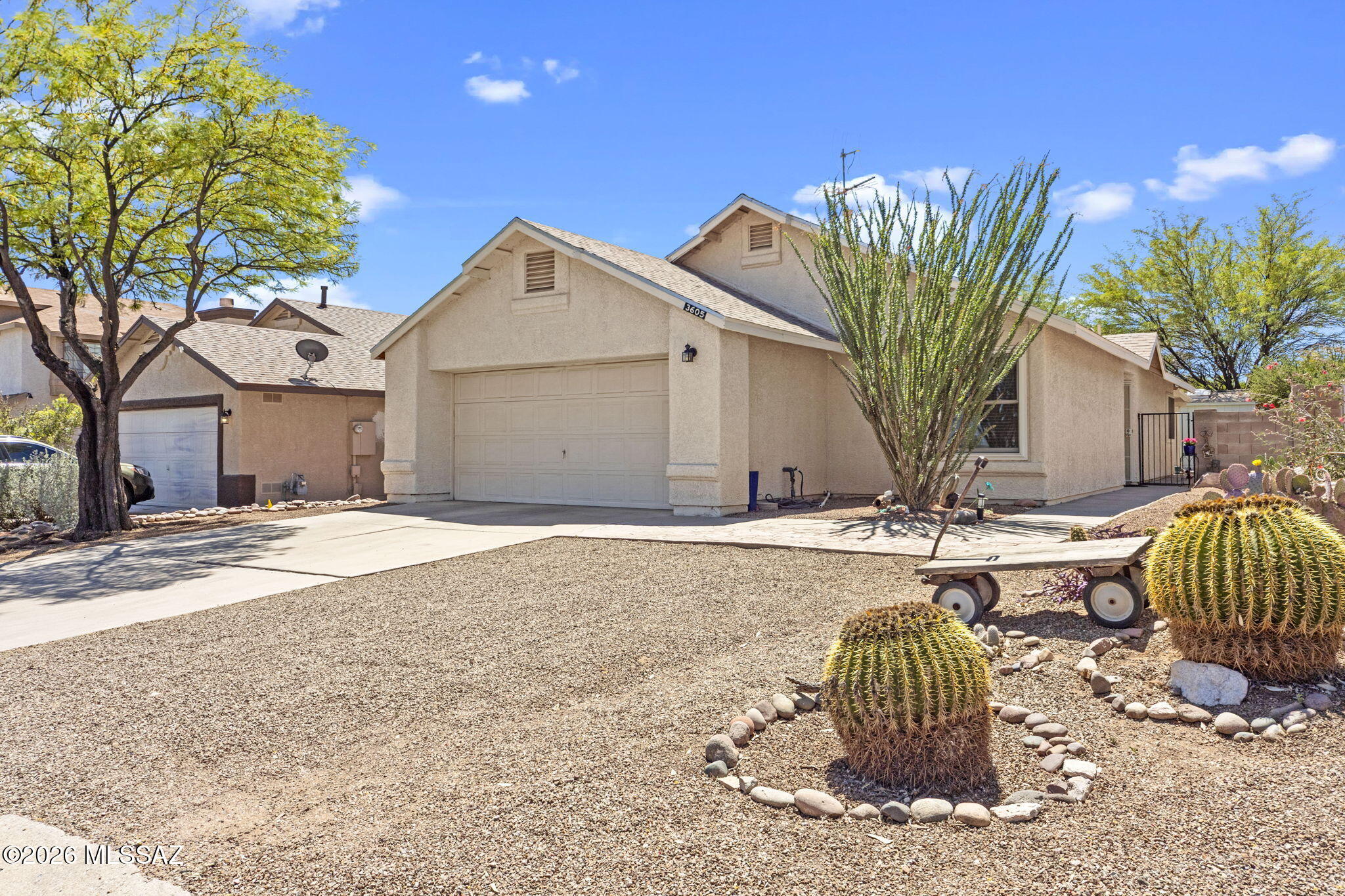 Seller to entertain/counter offers from $275k-$300k. This beautiful home is located in the Highly Desirable Presidio Hills neighborhood on the Southwest side of Tucson. This single-owner, single-story home has everything you are looking for. Three bedrooms and two full bathrooms. The custom concrete flooring, updated Renewal by Anderson windows and tasteful neutral palette are just some of the features of this move in ready home. Built in the heart of the neighborhood with a tastefully landscaped front yard,  this home definitely has curb appeal. 
This home features a large open Great Room with Dining Area overlooking the rear patio. A fully functional Kitchen with a breakfast bar and counter seating. It has a split floor plan which is perfect for hosting friends and family. The Owners Suite is your private sanctuary, featuring an ensuite bathroom. The ensuite bath has an oversized garden shower/tub, an updated vanity with custom countertops and double sinks featuring a luxury faucet from the Benjamin supply company, and a walk-through to a very spacious walk-in closet.  Also there is a guest bedroom with a large closet located near the full guest bathroom, which includes a shower and tub. The third bedroom could also serve as a den, movie room, home office or craft room. Enjoy relaxing Arizona nights on the Covered patio. Low Maintenance rear yard featuring gravel rock, an access gate, established trees, and a garden shed. Neighborhood features include a basketball court, volleyball, a park and community pool. Convenience stores, medical facilities, and restaurants are all within 5 minutes. Make an appointment to see this today!