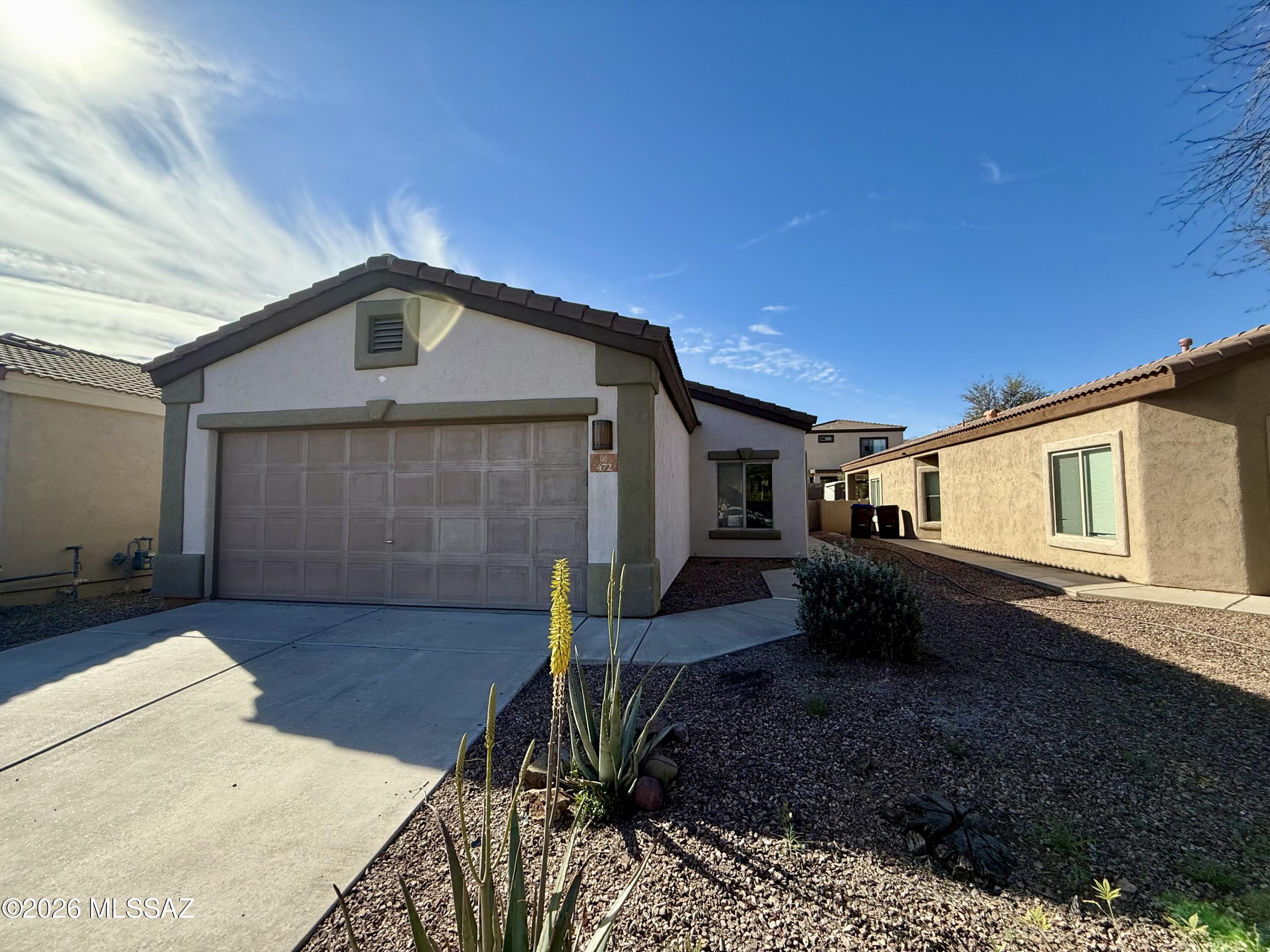 1,387 SQ FT! 3-bedroom, 2-bath home in Sahuarita's Presidio de las Estrellas neighborhood. Desirable single-story floor plan. Charming kitchen with included appliances: Dishwasher, Microwave, Oven, and Refrigerator. Spacious living areas, perfect for entertaining! Wood and tile flooring in all the right places. This home offers 3 nicely sized bedrooms. Primary suite features a private bathroom. Ceiling fans and blinds throughout. Laundry room with washer/dryer hookups. 1-car garage! Enjoy a backyard with a covered patio. Great Sahuarita location with nearby schools, parks, shopping, dining, and entertainment.

Agents please see Office Remarks.
