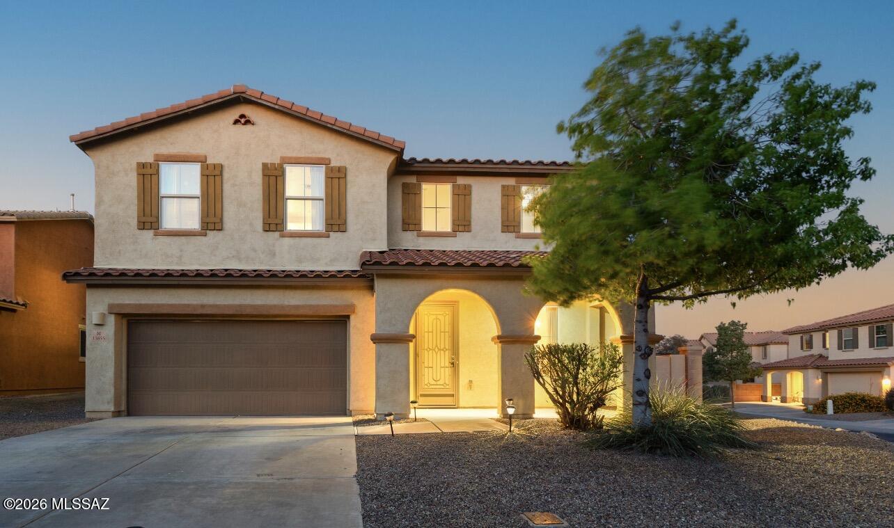 Corner lot that is just under a quarter acre (8,943 square feet)!! Notable upgrades include a gourmet kitchen featuring double wall-mount ovens, a gas cooktop stove, white cabinets and granite counter tops and an oversized walk-in pantry. The layout includes 4 bedrooms and 3 full baths, with one bedroom and a full bath located downstairs. Also downstairs is a formal dining/flex room/den, while the upstairs features a large loft. The Primary bedroom includes a Deluxe Master bath with a dual vanity, a separate garden tub and shower, and two walk-in closets. The two additional bedrooms also feature walk-in closets. Large back patio with extended pavers, providing a seating area for furniture and a fire pit, all surrounded by turf. Also enjoy the amenities that Rancho Sahuarita offers.