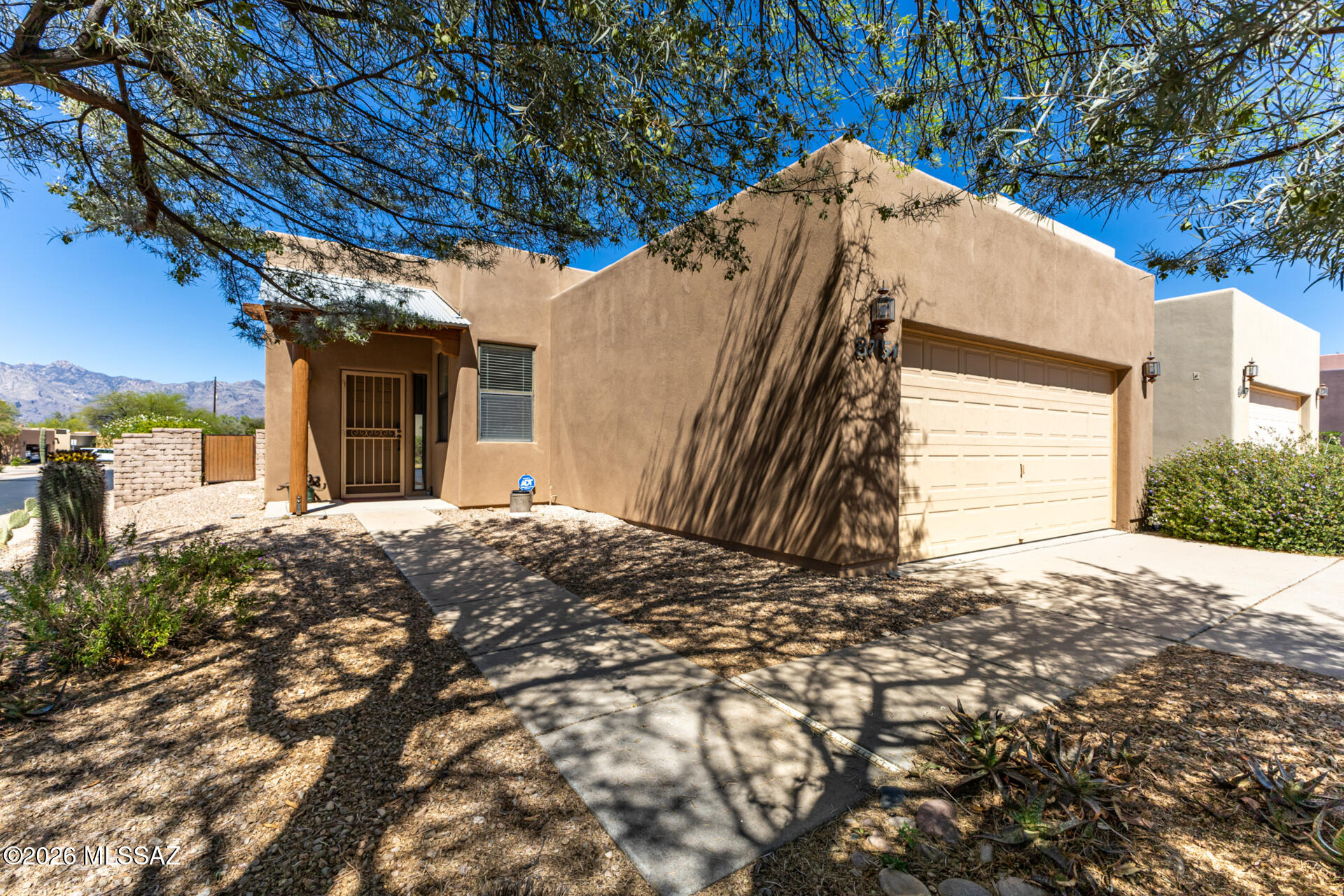 Beautifully maintained and rarely available Miramonte home located in a desirable gated Barrio subdivision. This elevated end
property offers extra privacy and sweeping north facing mountain views from the inviting covered patio, perfect for relaxing
mornings or sunset evenings. Inside, you'll find an open, bright floorplan filled with natural light and comfortable living spaces. The flexible layout features 2 bd plus a den, or an easy 3 bd configuration, ideal for guests, a home office, or hobbies. The nicely landscaped yard complements the outdoor living area, creating a peaceful desert retreat. Enjoy the charm, security, and low maintenance lifestyle of this sought after community while taking in the stunning mountain backdrop. Don't miss this opportunity.