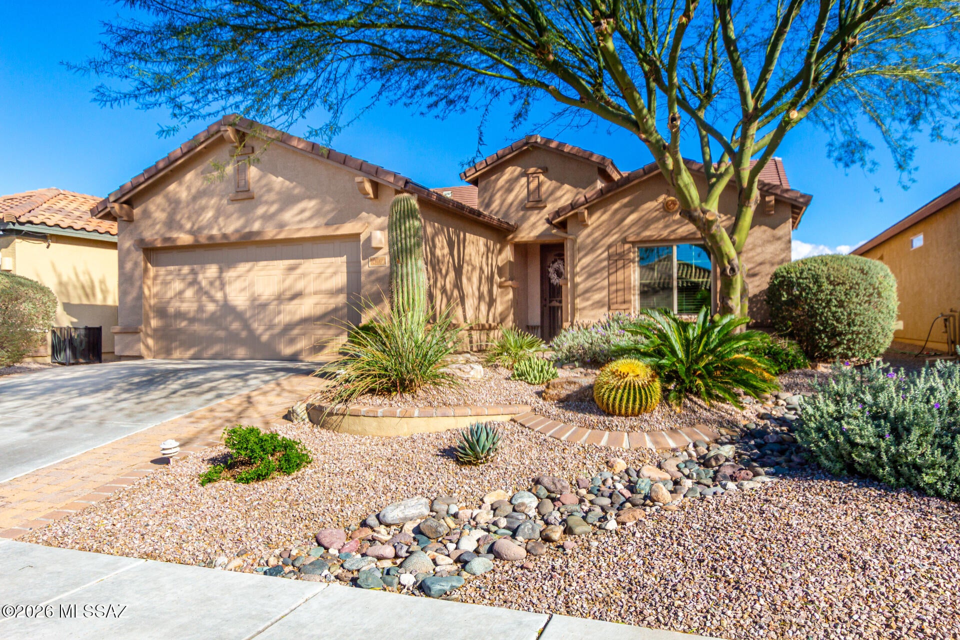 Welcome to this beautifully maintained home in the sought-after 55+ Del Webb community, perfectly positioned with no neighbors behind and stunning mountain views. Offering over $25,000 in recent upgrades, this move-in-ready home delivers comfort, efficiency, and peace of mind. Highlights include a tankless water heater (2025), new kitchen cabinets (2024), high-end induction range, gutters and exterior paint completed in 2024, and refinished bathroom and laundry cabinetry. The garage features heating and cooling added in 2023. Enjoy a functional open layout, private backyard, and a quiet setting ideal for relaxing and taking in Arizona sunsets--all just minutes from resort-style community amenities. Don't let this beauty pass you by.