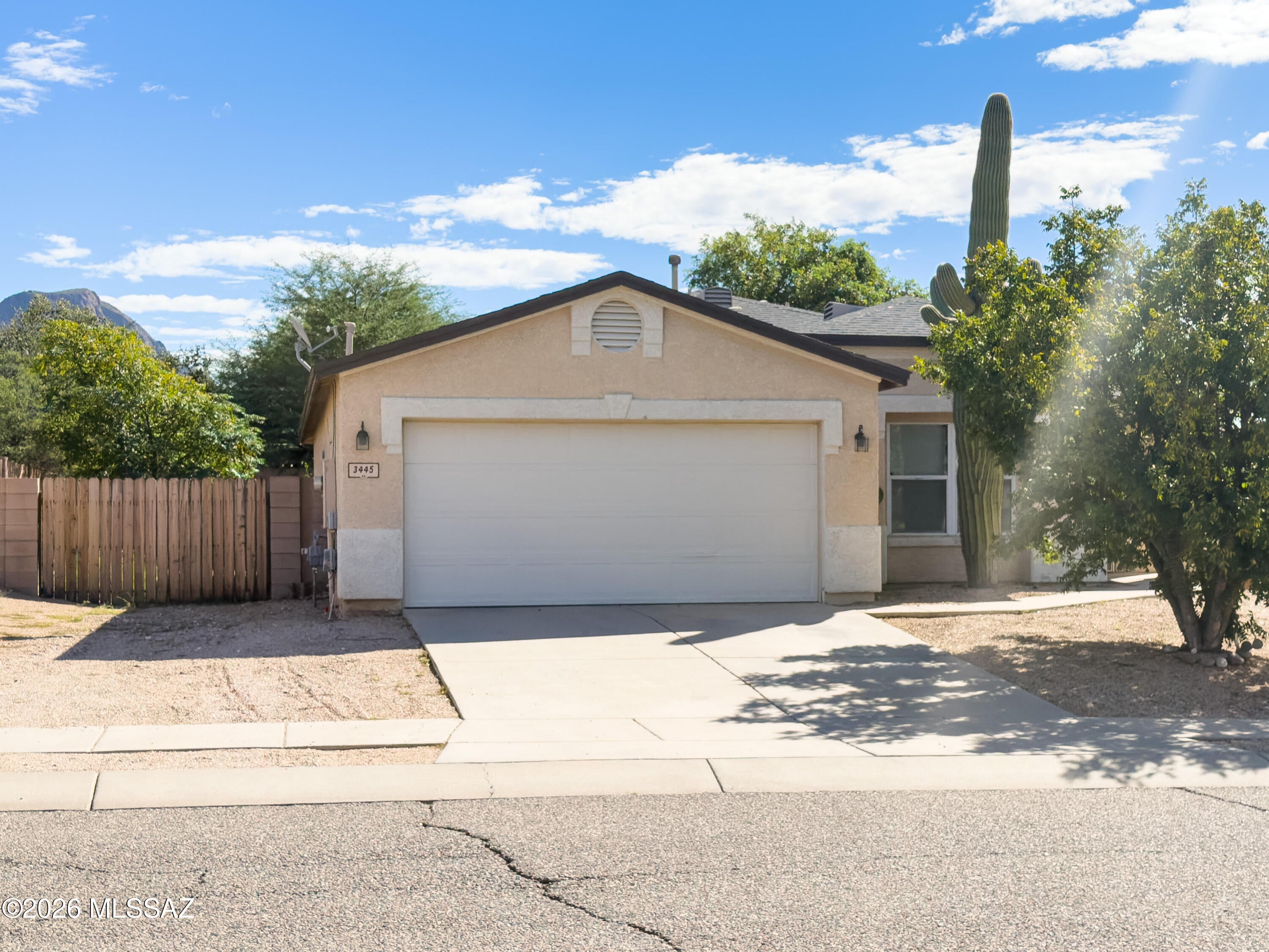 Great opportunity for fix up or sweat equity in the desirable Tucson Mountain Sanctuary.  A little TLC will make this home sparkle! Open and inviting floorplan, lots of windows for natural light. 3 spacious bedrooms and 2 baths.  Primary bedroom includes a huge closet and en-suite bath with oversized garden tub. Amazing backyard with extra large shaded patio, mature landscaping front and back includes shady trees, flowering rose bushes, citrus trees and a majestic saguaro. Double gate to the side yard for extra of toys, low trailers, etc. Don't miss out on this one!