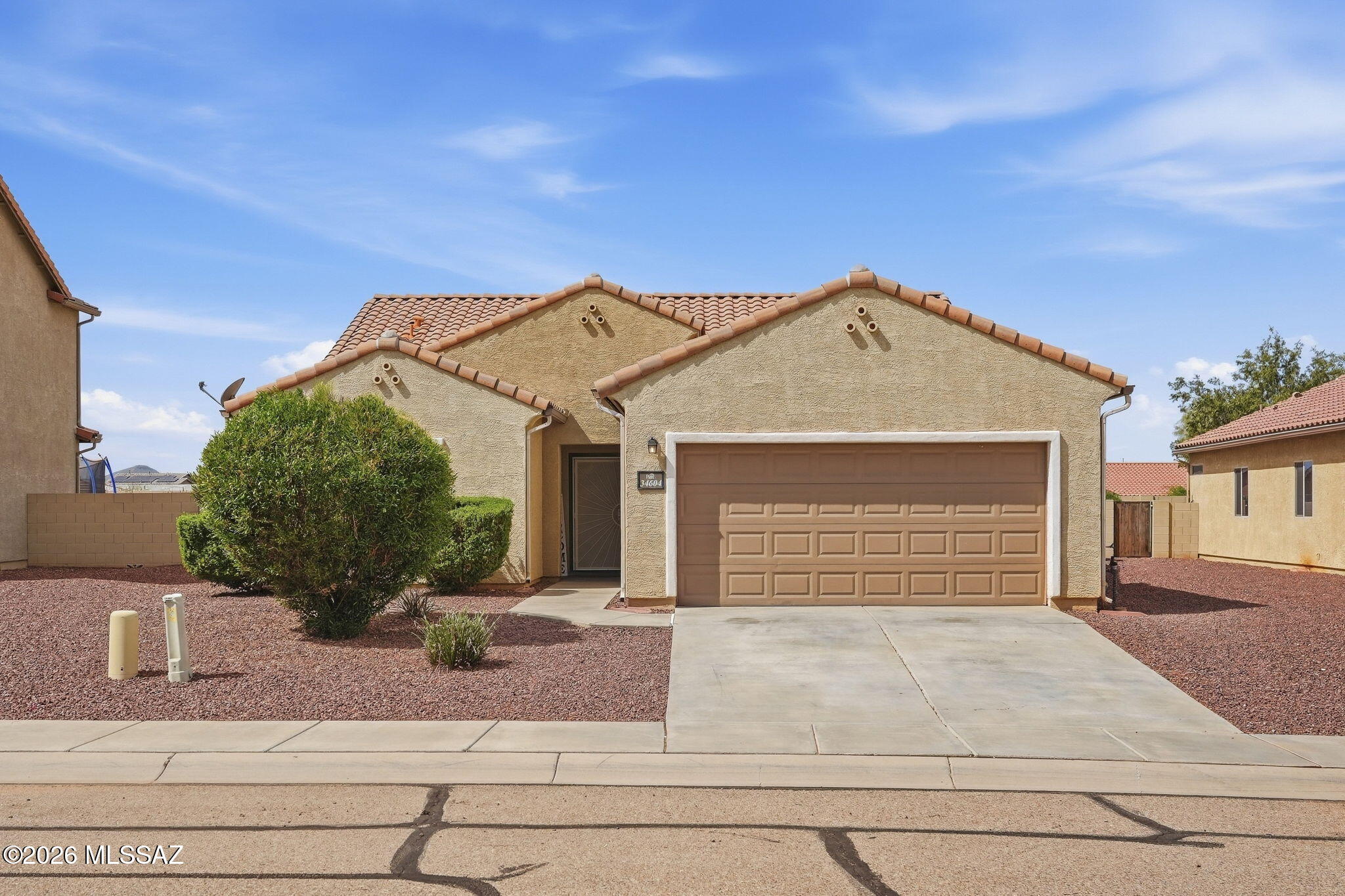Welcome home to the Red Rock community! This 3-bedroom, 2-bath home offers 1,756 sq. ft. of comfortable living space and a 2-car garage. Enjoy fresh interior paint, a new water heater, and a beautiful kitchen featuring granite countertops and an eye-catching backsplash. The spacious primary suite boasts a walk-in closet practically the size of another bedroom! Washer and dryer included. Enjoy K-12 community schools, pools, parks, basketball courts, great neighbors, and easy I-10 access. A wonderful home in a close-knit community!