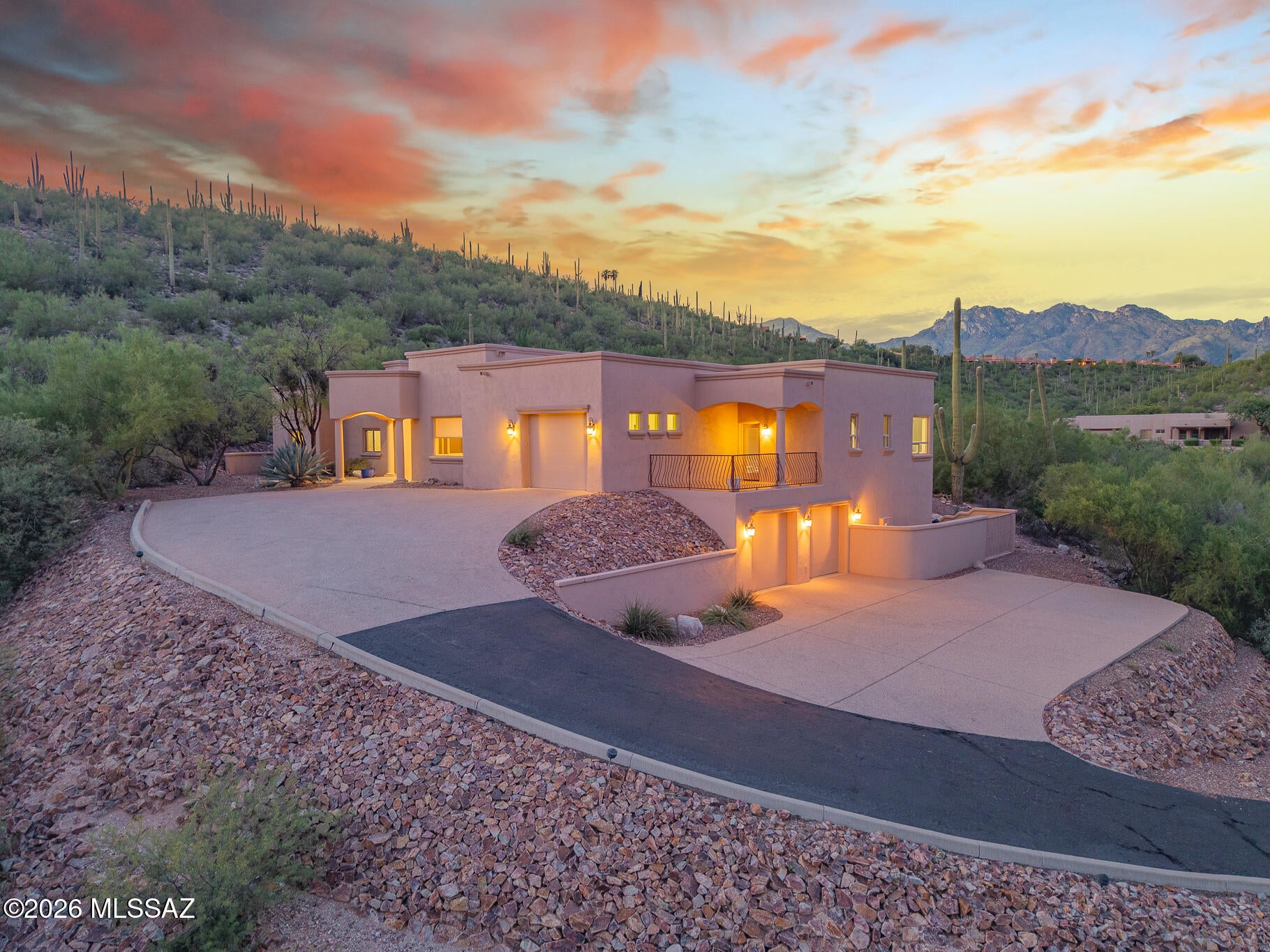Tucked into the Catalina Foothills, this exceptional luxury residence offers a rare opportunity to experience the very best of Tucson living. Framed by the natural beauty of the Sonoran Desert, the home pairs refined interiors with an effortless indoor-outdoor lifestyle, creating a setting that feels both private and inviting. Expansive living spaces, abundant natural light, and thoughtful details throughout set the stage for quiet mornings, unforgettable sunsets, and evenings spent entertaining under the desert sky. All just moments from renowned dining, shopping, hiking, and the lifestyle that makes the Catalina Foothills one of Tucson's most coveted places to call home.