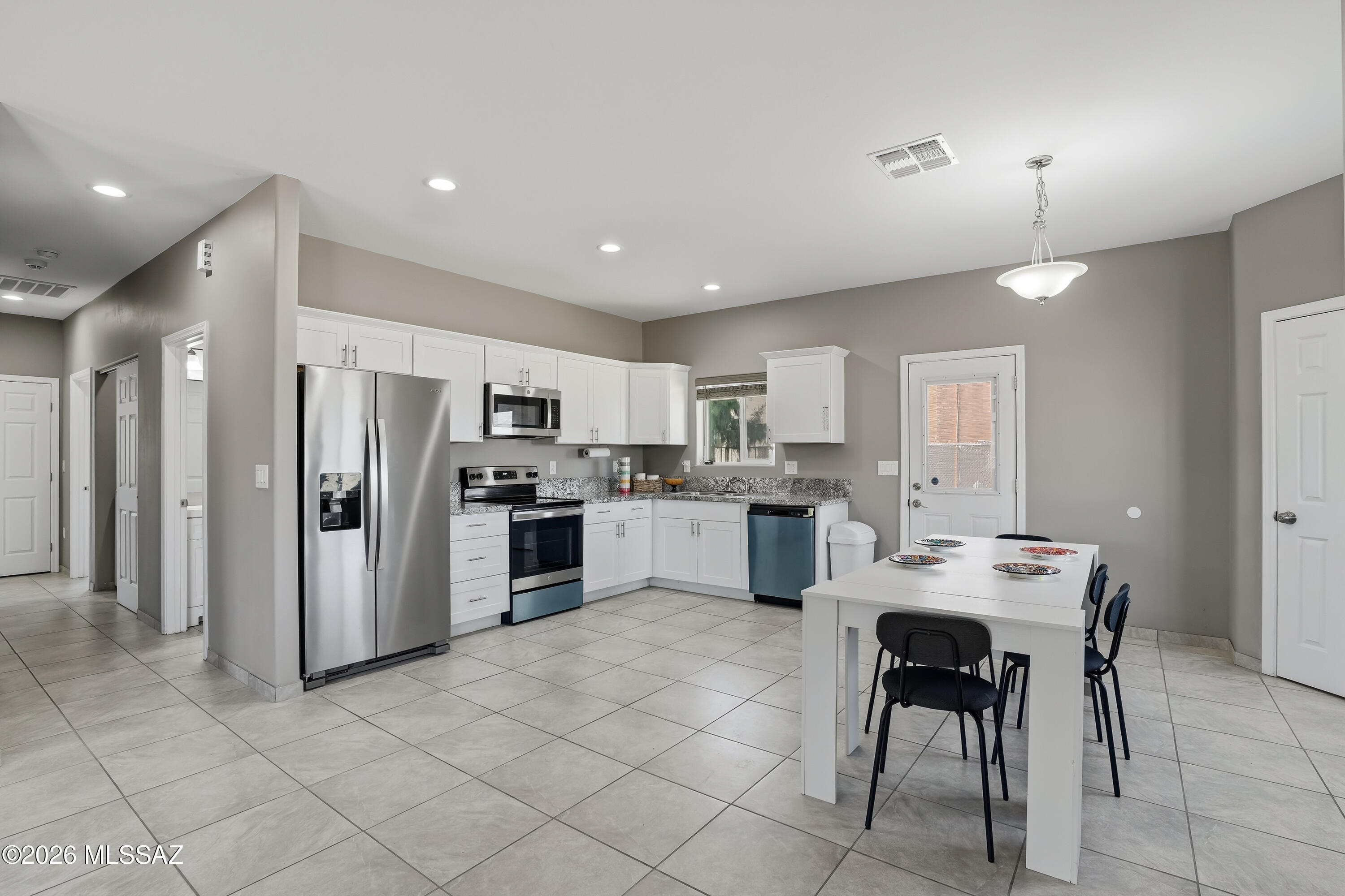 NO HOA. Large Yard. Mountain View. Newly built(in 2023),3B2B Single Family nests in heart of Tucson. Beautiful Granite counters through out home, tons of storage, newly, stainless steel appliances, washer/dryer installed in 2023 like new. Located in Tucson Central and close I-10 for easy commuting as well as shopping around the corner. The large yard offers unlimited potential to build and personalize your dream outdoor retreat.