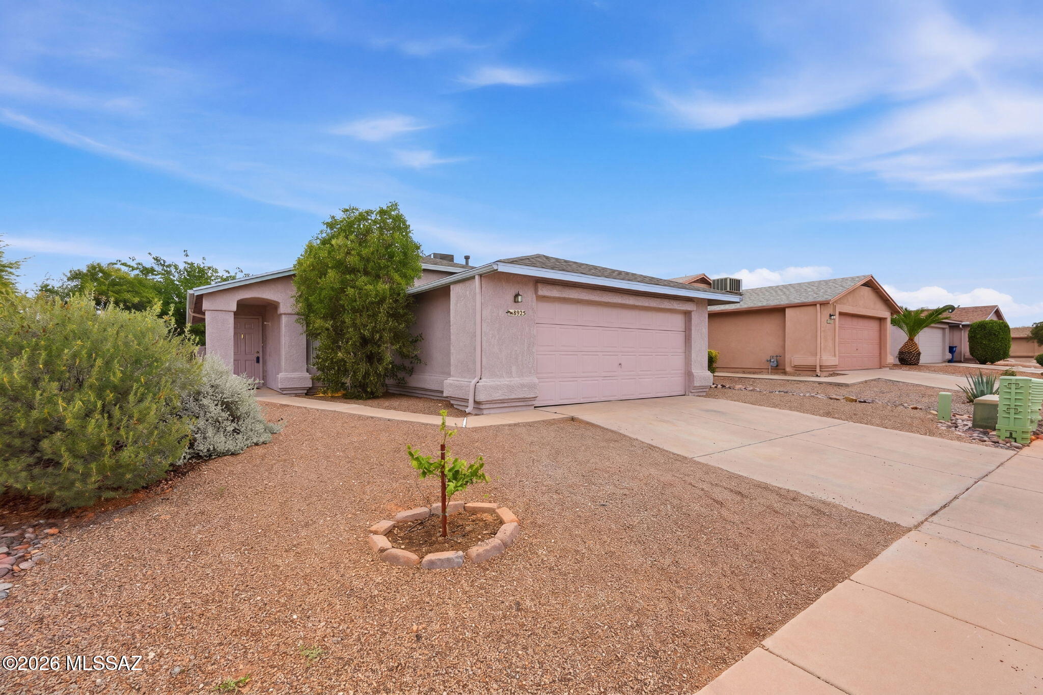 Roof, HVAC and water heater new within the last 3 years! Gem of a property tucked away in a cul-de-sac! Charming 3 bedroom, 2 bath home with 2-car garage, no carpet, and low-care landscaping. Easy-care backyard features turf and citrus tree. Excellent eastside location near Saguaro National Park hiking/biking trails, BMX bike park, hospitals, and Pima Community College. Move-in ready with major systems already updated!